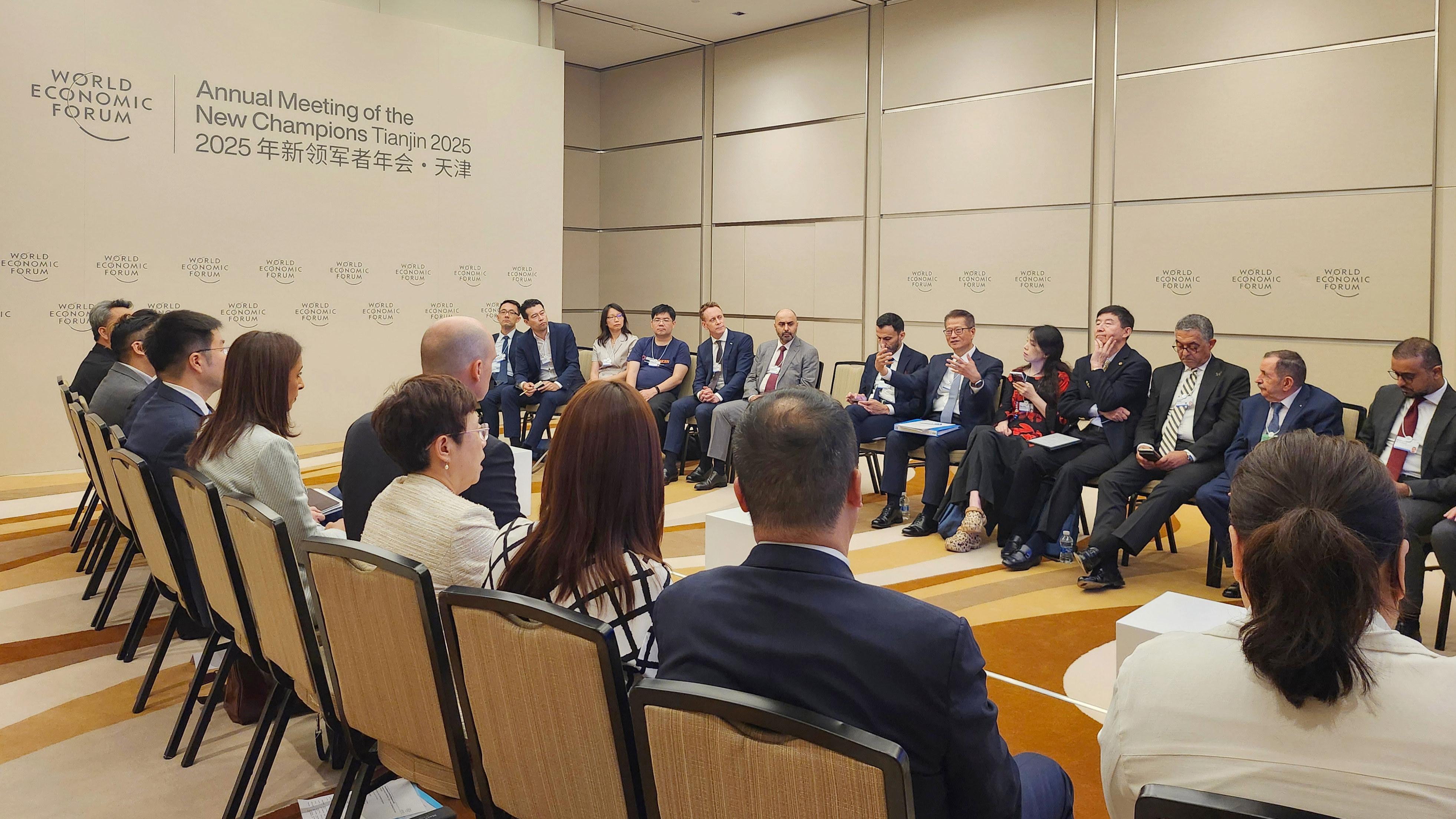 The Financial Secretary, Mr Paul Chan (sixth left), visited Tianjin today (June 24) and attended the World Economic Forum Annual Meeting of the New Champions 2025 (also known as Summer Davos). Photo shows Mr Chan speaking at a discussion session on the trade and investment relationship between the Middle East and North Africa and China.
