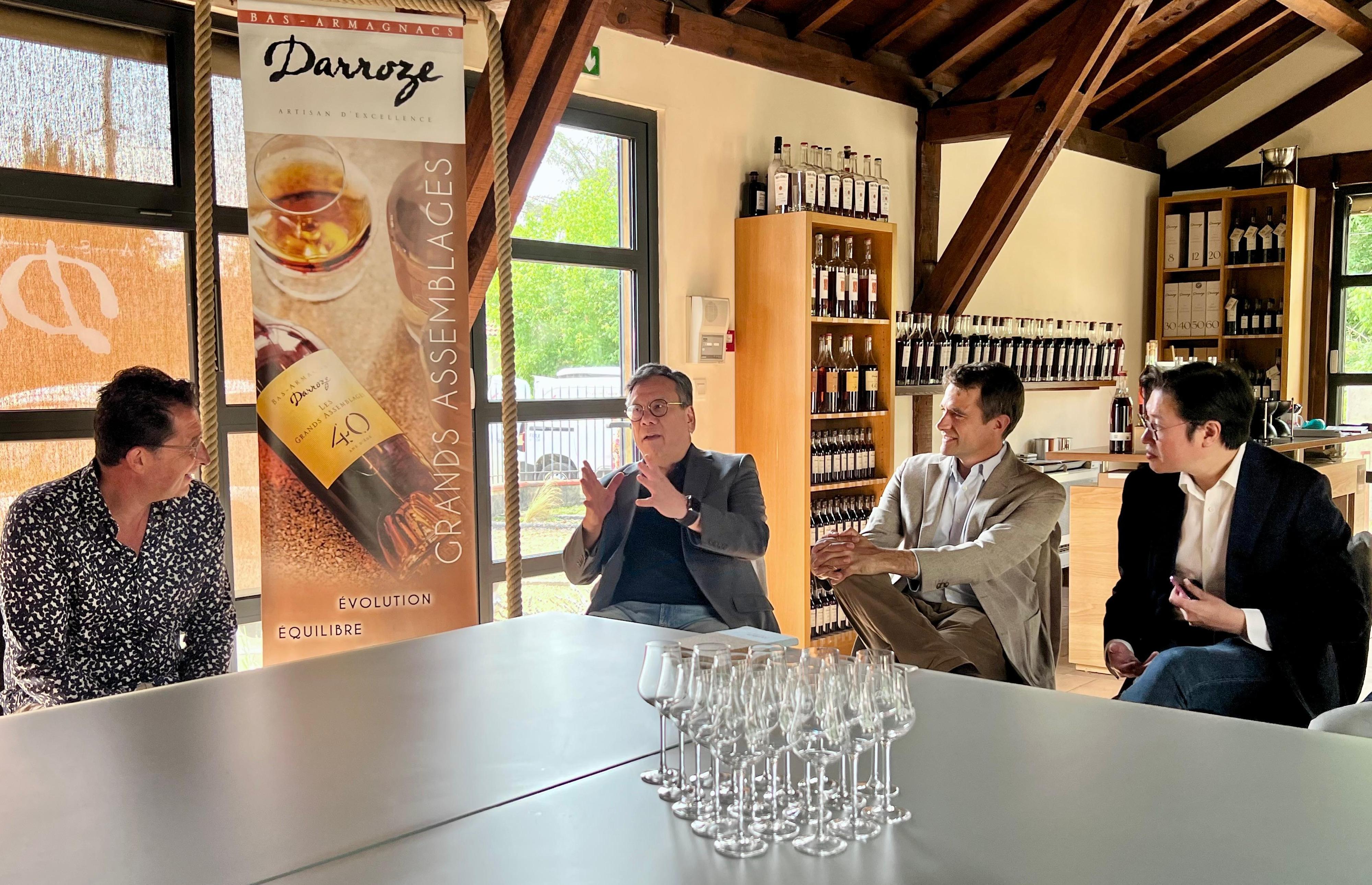 The Secretary for Commerce and Economic Development, Mr Algernon Yau, continued with the last day of his visit to France on June 24 (France time). Photo shows Mr Yau (second left) visiting a wine cellar in Armagnac and meeting with representatives of the Armagnac trade on June 23 (France time) to exchange views on promoting Hong Kong as a liquor trading hub.