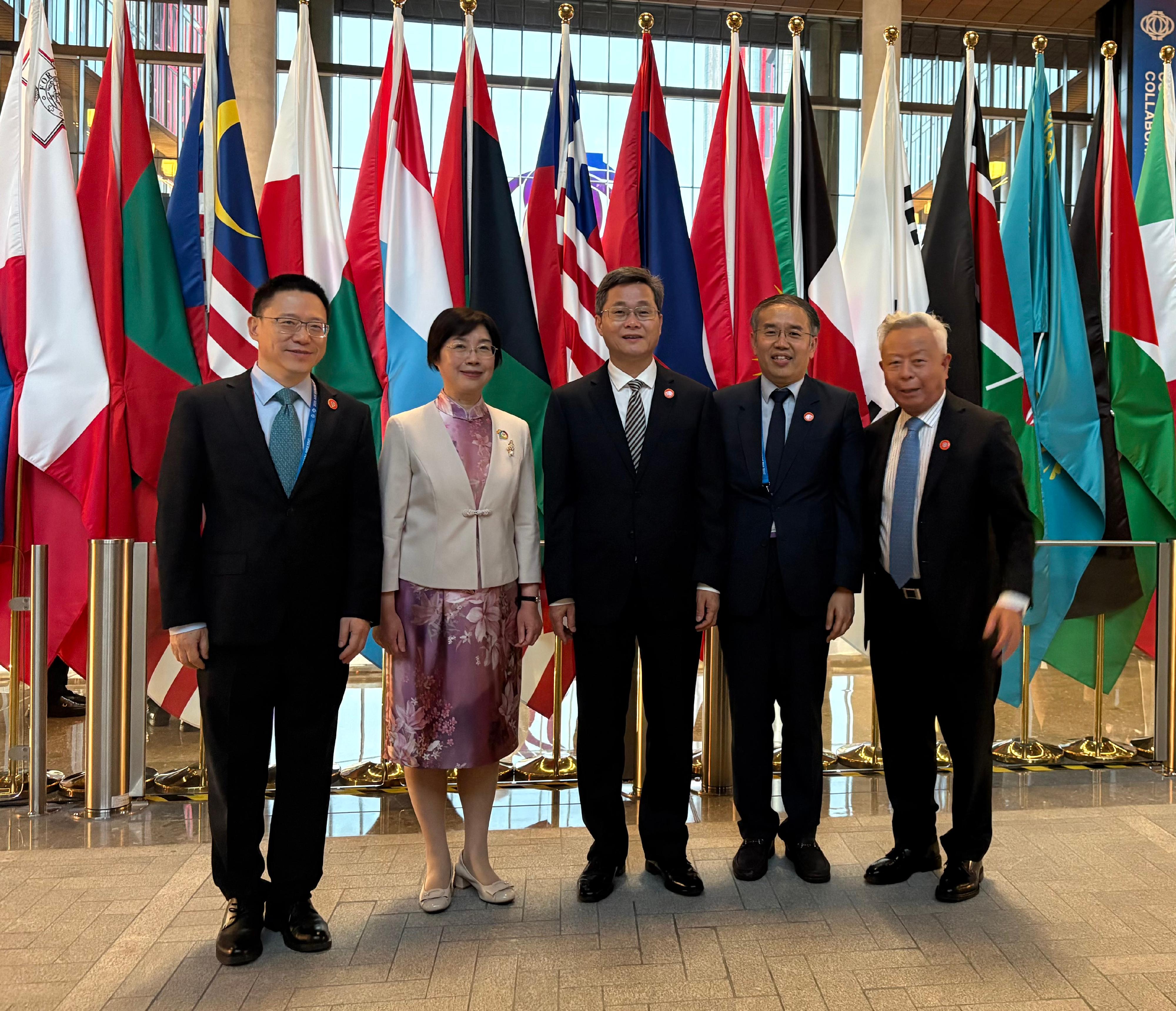 The Secretary for Financial Services and the Treasury, Mr Christopher Hui (second right), is pictured with the Minister of Finance, Mr Lan Fo'an (centre); Vice Minister of Finance Mr Liao Min (first left); the President of the Asian Infrastructure Investment Bank (AIIB), Mr Jin Liqun (first right); and the President-elect of the AIIB, Ms Zou Jiayi (second left), at the President's Reception of the 10th Annual Meeting of the Board of Governors of the AIIB in Beijing yesterday (June 24).