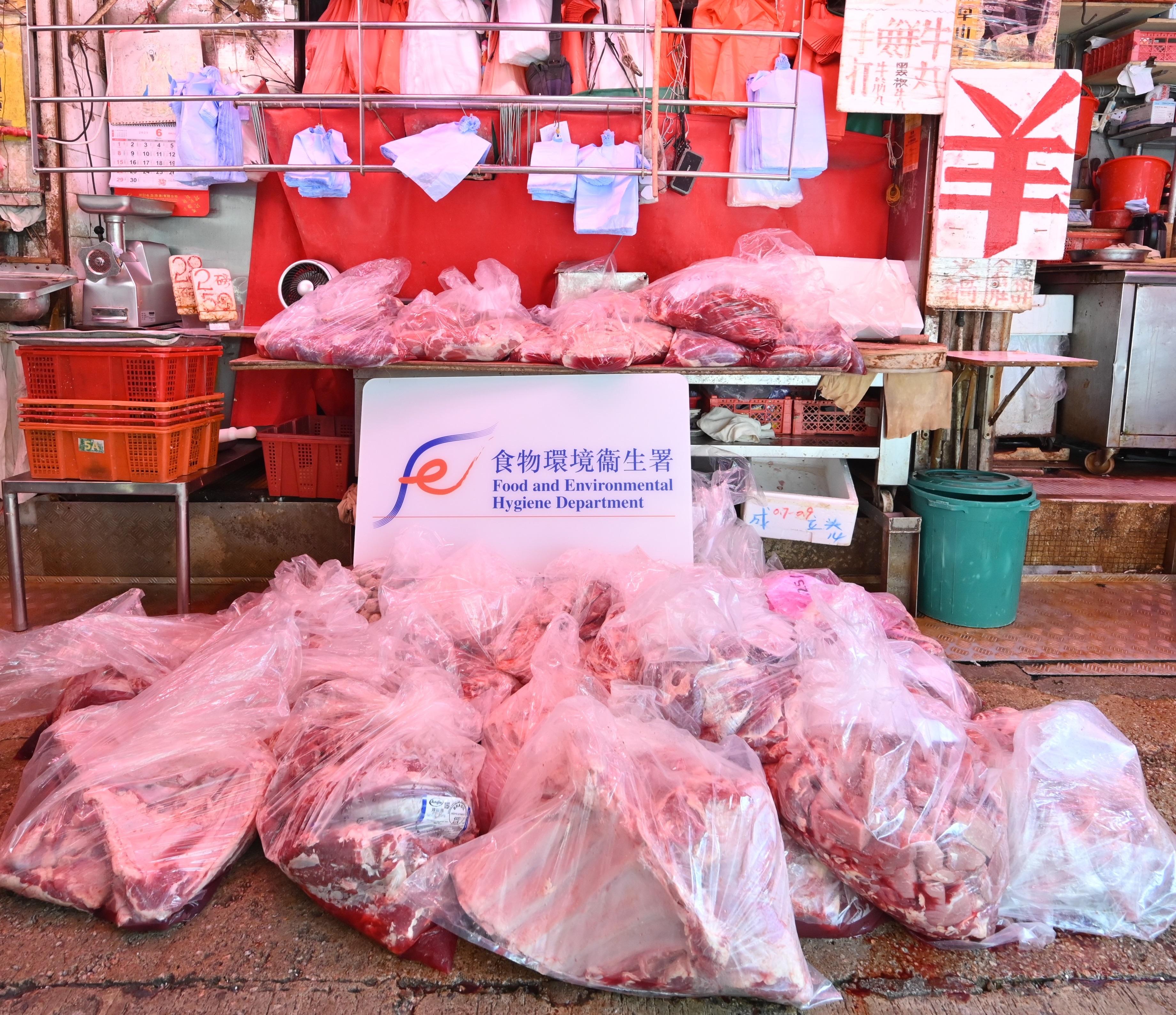 The Food and Environmental Hygiene Department (FEHD) today (June 25) conducted a raid on a licensed fresh provision shop in Kwun Tong District suspected of selling frozen meat as fresh meat. Photo shows some of the meat seized by FEHD officers during the operation.
