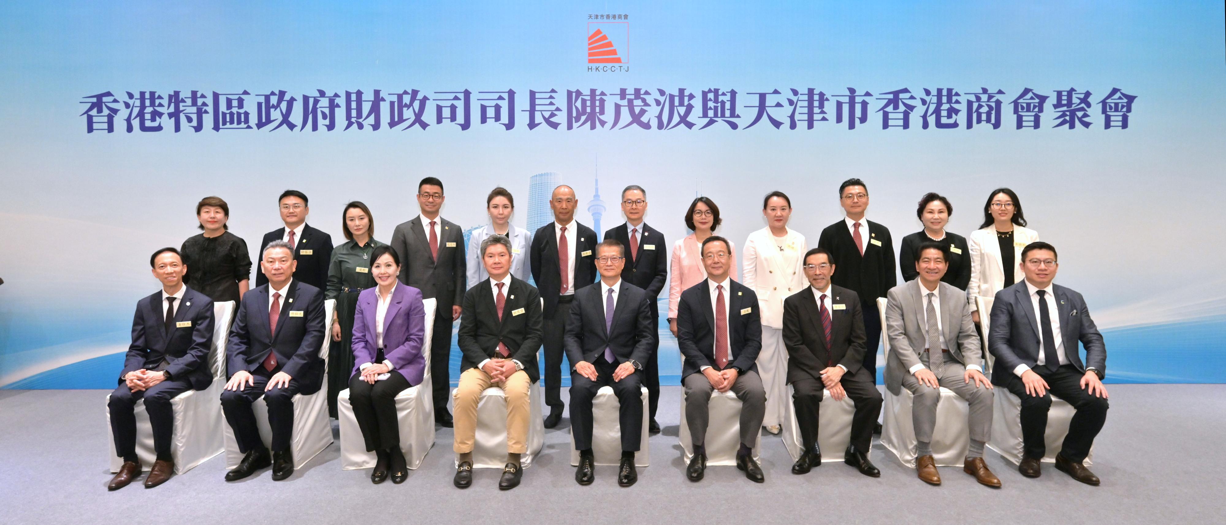 The Financial Secretary, Mr Paul Chan, continued his visit to Tianjin today (June 25) and attended the World Economic Forum Annual Meeting of the New Champions 2025 (also known as Summer Davos). Photo shows Mr Chan (front row, centre) and members of the Hong Kong Chamber of Commerce in Tianjin at a gathering organised by the chamber. 