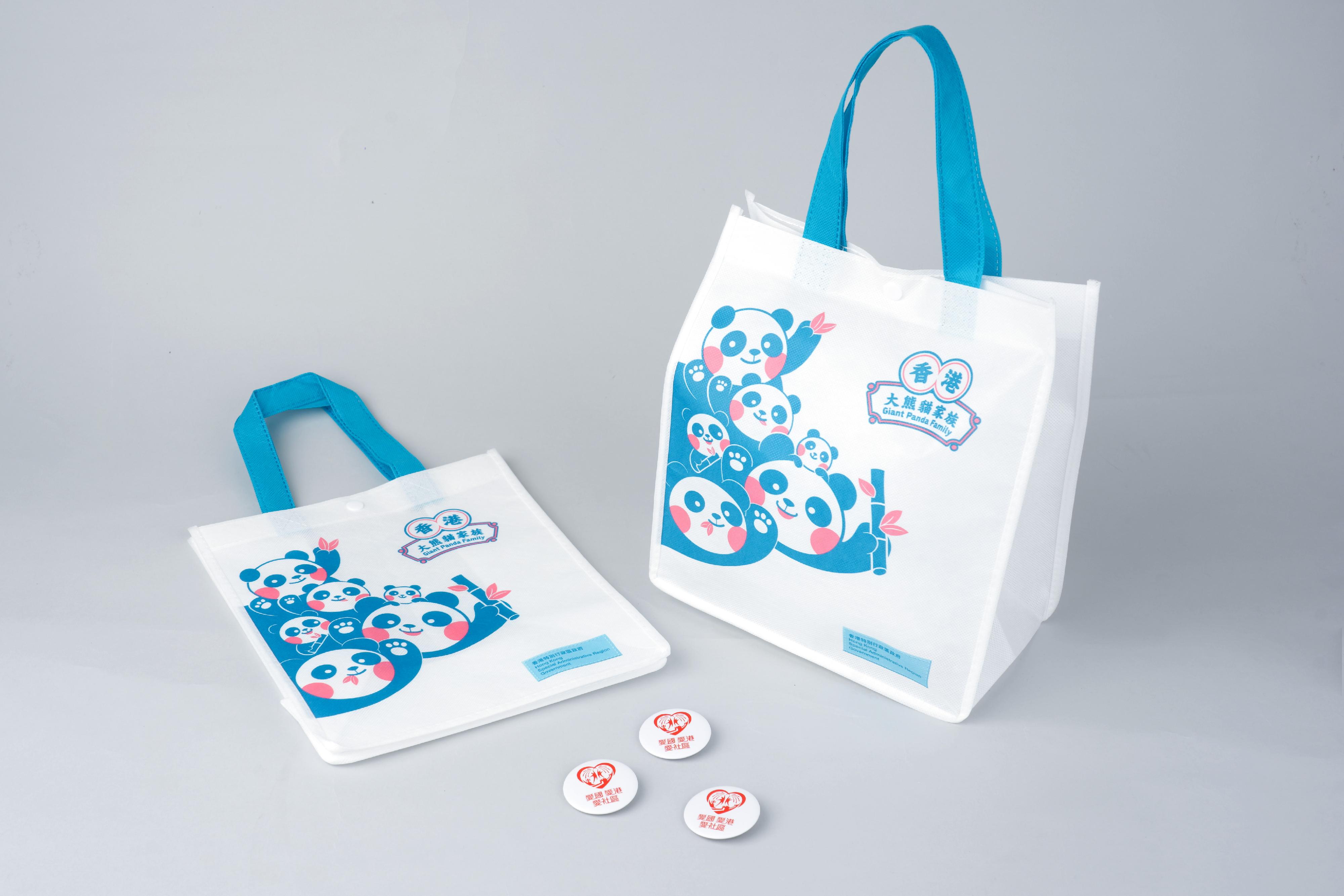 To commemorate the 28th anniversary of the establishment of the Hong Kong Special Administrative Region of the People's Republic of China and further promote patriotic education, the Information Services Department has designed and produced a series of tote bags showcasing the Giant Panda Family. One of the designs will be gifted to local primary school students by the Working Group on Patriotic Education. The tote bags, together with badges with messages of loving our country, Hong Kong and our community, are distributed to local primary school students starting from today (June 26).