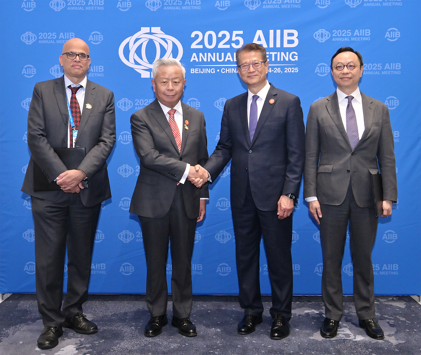 The Hong Kong Monetary Authority (HKMA) and the Asian Infrastructure Investment Bank (AIIB) today (June 26) signed a partnership agreement to support venture capital in emerging Asia. Photo shows (from left) the Acting Chief Investment Officer of the AIIB, Mr Rajat Misra; the President of the AIIB, Mr Jin Liqun; the Financial Secretary of the Hong Kong Special Administrative Region Government, Mr Paul Chan; and Deputy Chief Executive of the HKMA, Mr Darryl Chan, in Beijing.