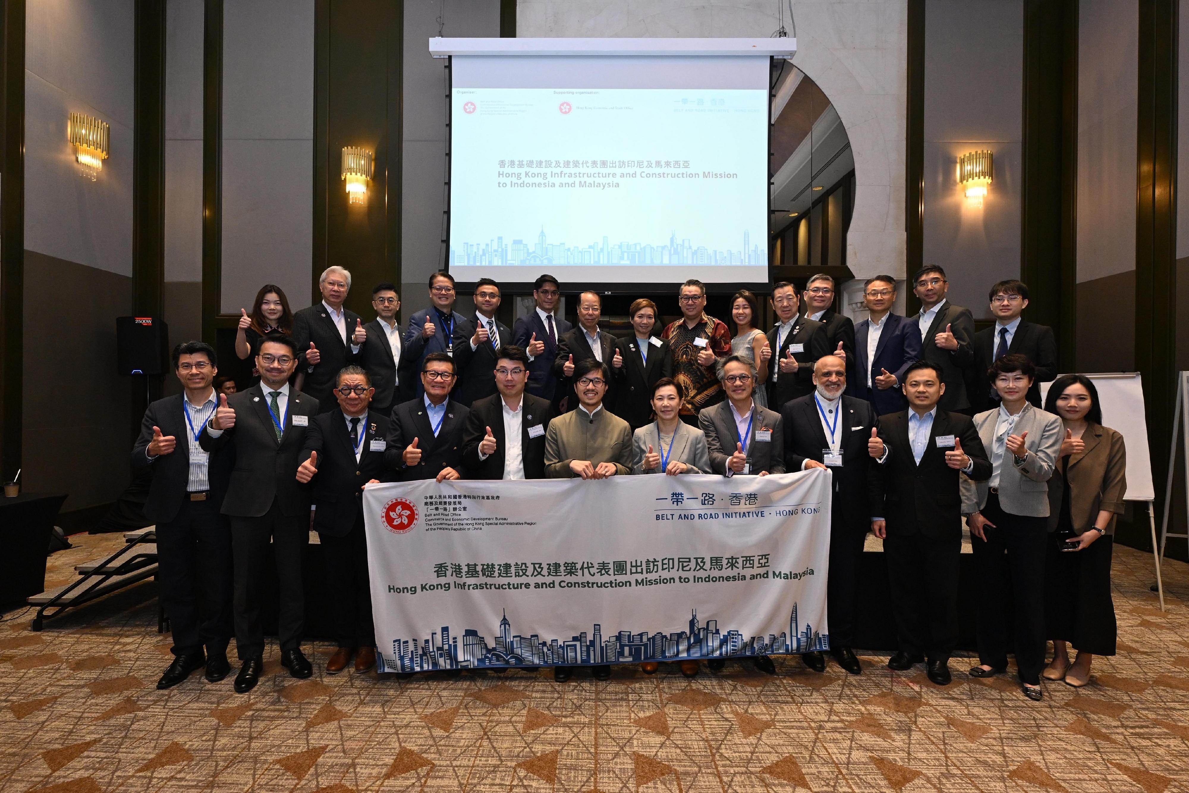 The Commissioner for Belt and Road, Mr Nicholas Ho, led a delegation to visit Indonesia and Malaysia from June 22 to 26. Photo shows Mr Ho (front row, sixth left) with members of the delegation and representatives from Hong Kong enterprises and organisations. Also present is the Director-General of the Hong Kong Economic and Trade Office in Jakarta, Miss Libera Cheng (front row, sixth right).
