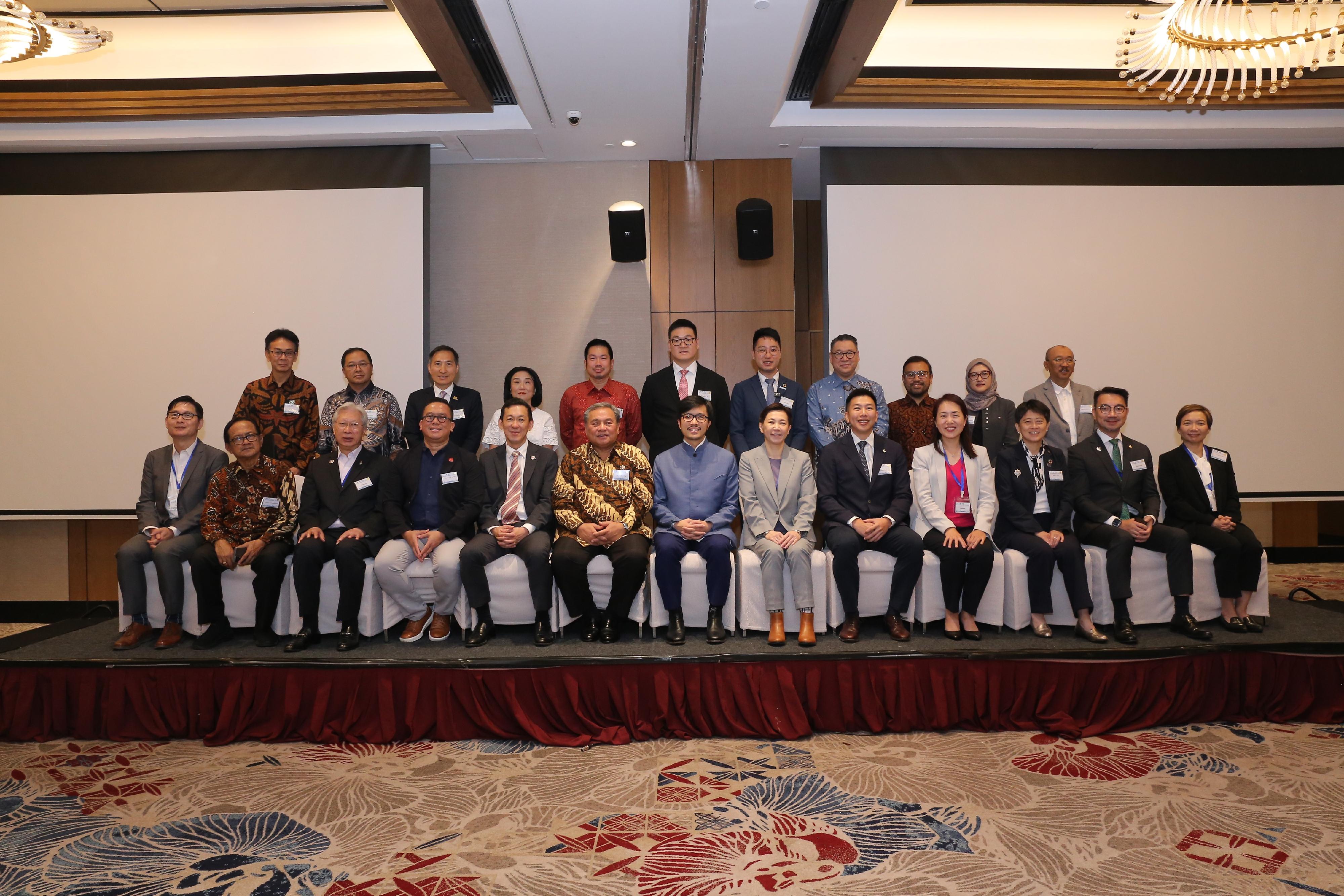During the visit of a delegation led by the Commissioner for Belt and Road, Mr Nicholas Ho, to Indonesia and Malaysia from June 22 to 26, members of the delegation and representatives from Hong Kong enterprises and organisations signed 21 Memoranda of Understanding (MOU) with their local partners. Photo shows Mr Ho (front row, centre) with the MOU signatories in Jakarta on June 24. The Director-General of the Hong Kong Economic and Trade Office in Jakarta, Miss Libera Cheng (front row, sixth right), also attended.