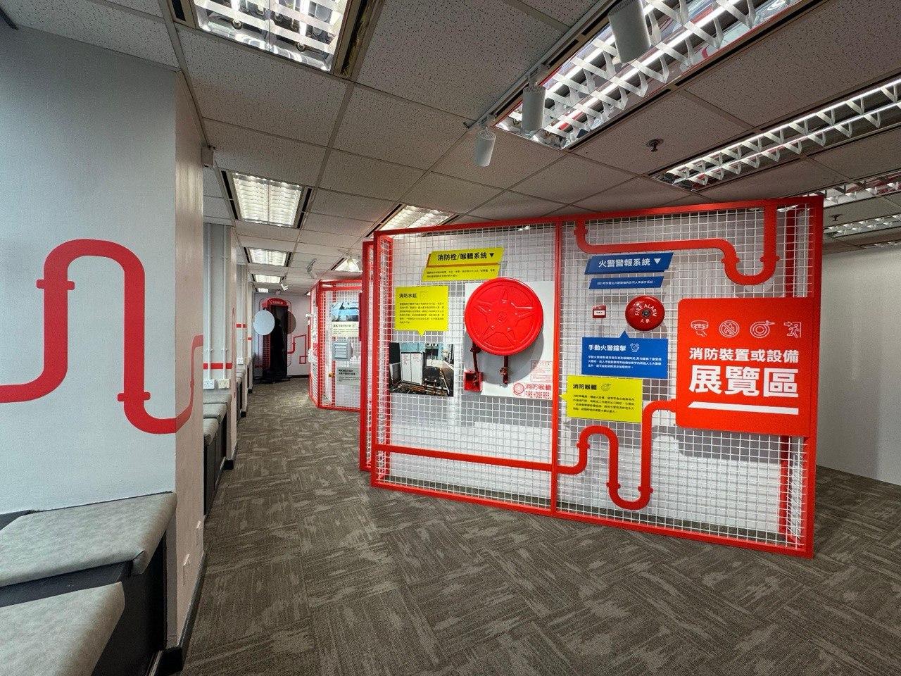 The Fire Services Department (FSD) announced today (June 26) that new FSD Building Improvement Support Centres (BISCs) have been established in Wan Chai and Yuen Long respectively to provide more convenient one-stop support services for owners and occupiers of old buildings on Hong Kong Island and in the New Territories. Photo shows the exhibition area in the BISC in Wan Chai displaying various fire service installations and equipment, enabling the public to gain a deeper understanding of the related information.