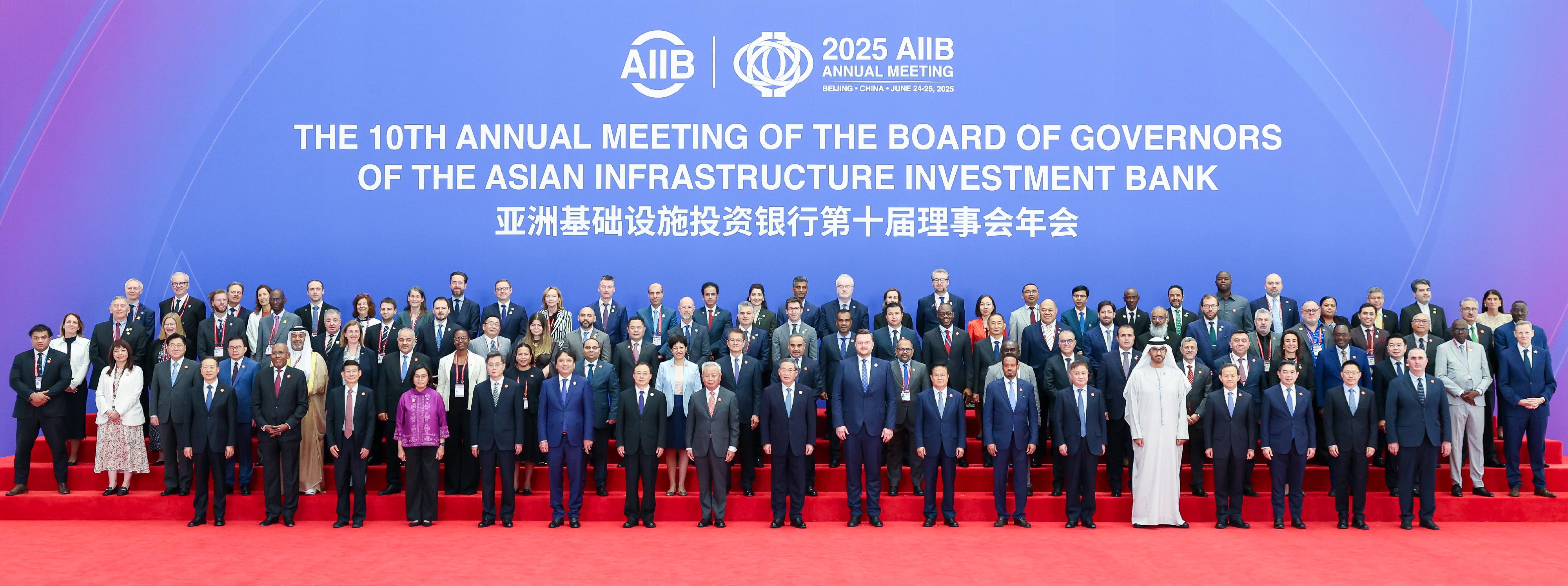 The Financial Secretary, Mr Paul Chan, attended the 10th Annual Meeting of the Board of Governors of the Asian Infrastructure Investment Bank in Beijing on June 26. Photo shows Mr Chan (second row, twelfth left) participating in a group photo of Governors. 
