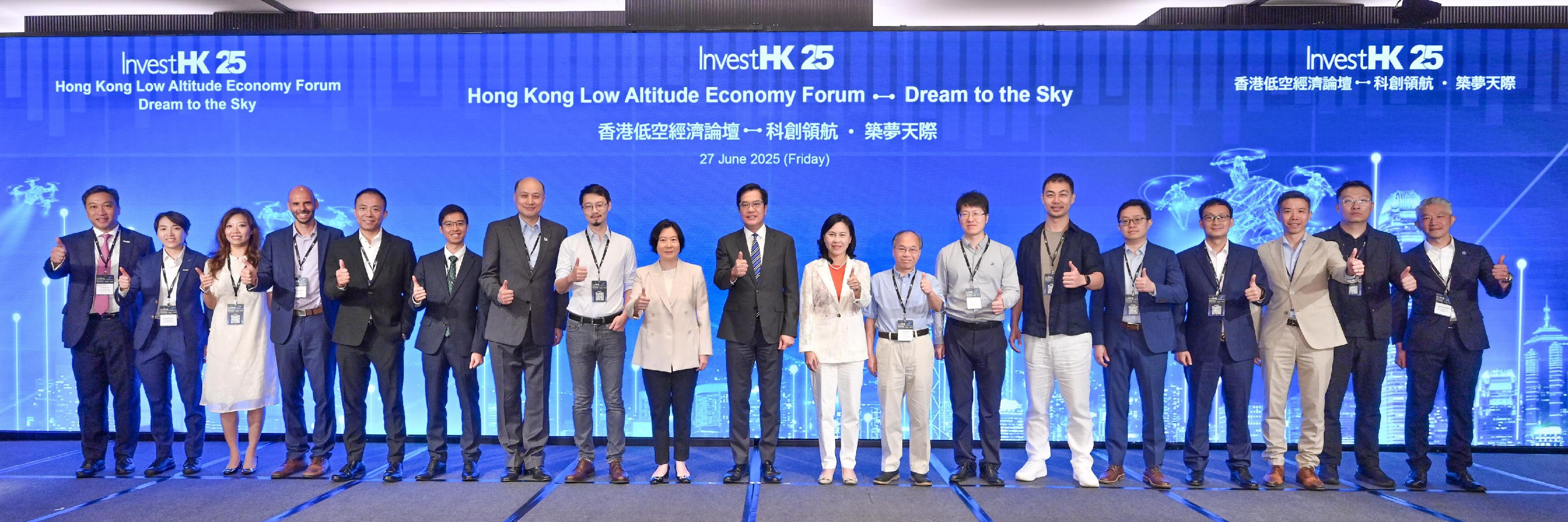 Invest Hong Kong (InvestHK) hosted the inaugural Hong Kong Low Altitude Economy Forum today (27 June), bringing together leaders from government, industry, academia and research to explore the development potential and application prospects of the low-altitude economy. Pictured are the Deputy Financial Secretary, Mr Michael Wong (center); the Secretary for Transport and Logistics, Ms Mable Chan (ninth right); the Director-General of Investment Promotion at InvestHK, Ms Alpha Lau (ninth left), and other guests.