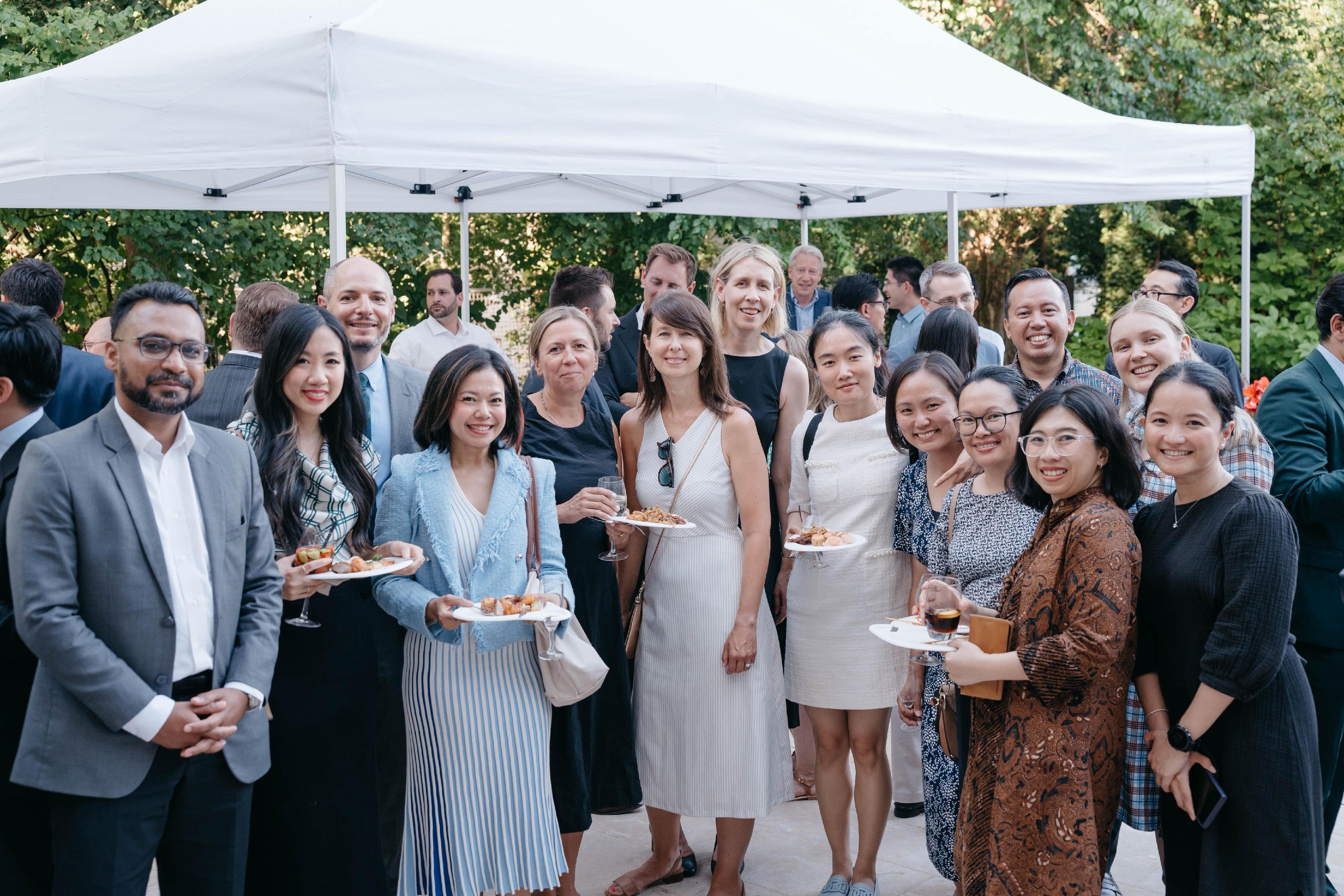 The Deputy Representative of the Hong Kong Special Administrative Region of China to the World Trade Organization, Miss Helen Kwan (front row, fourth right), pictured at the reception with delegates from Australia, Brunei Darussalam, Canada, China, the European Union, Indonesia, Malaysia, the Philippines, Thailand and the United States.