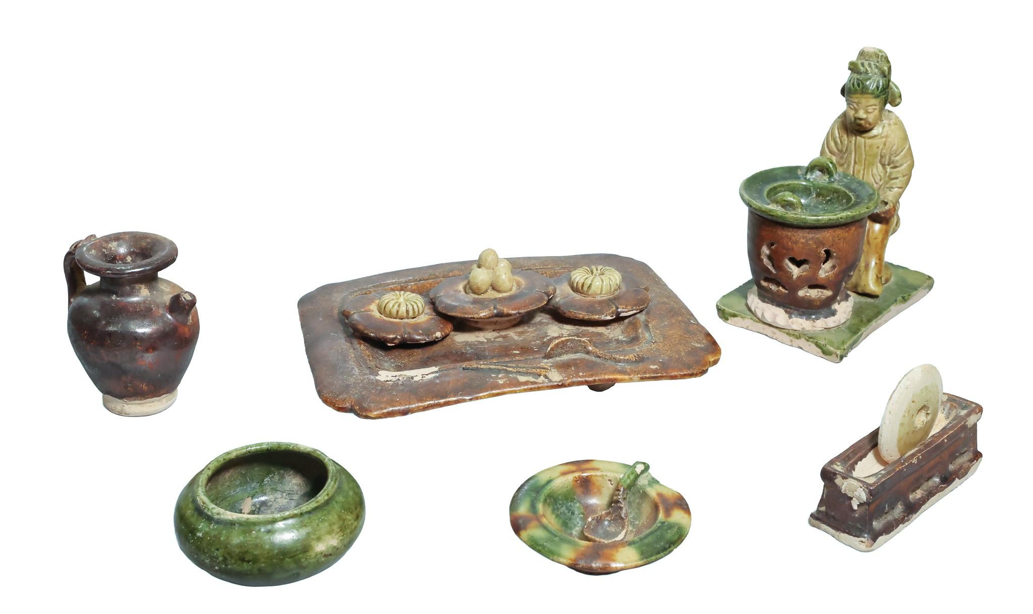 The opening ceremony of the exhibition entitled "Tang Vogue Beyond the Horizons: A Golden Era of Multicultural Integration and Openness" was held today (June 27) at the Hong Kong Heritage Discovery Centre. Photo shows a sancai teaware set with a seated figurine revealing the image of Lu Yu, China's sage of tea.