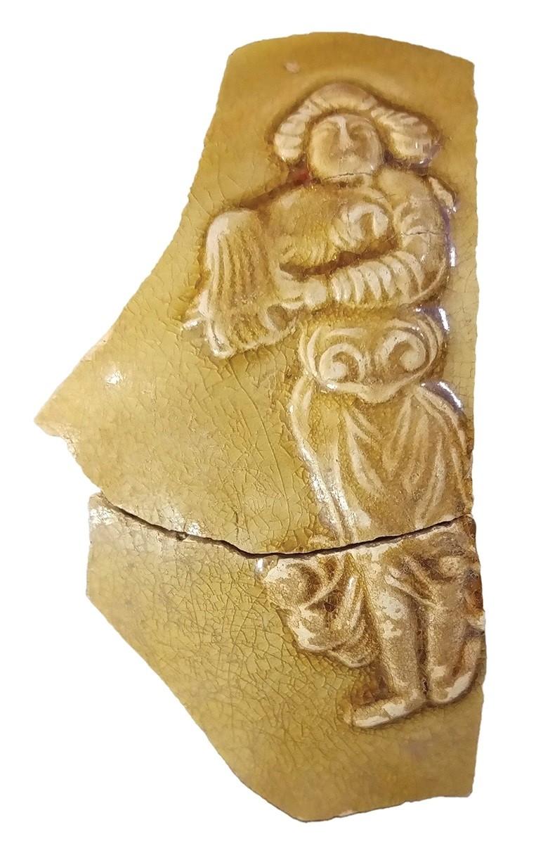 The opening ceremony of the exhibition entitled "Tang Vogue Beyond the Horizons: A Golden Era of Multicultural Integration and Openness" was held today (June 27) at the Hong Kong Heritage Discovery Centre. Photo shows a fragment of glazed porcelain with a foreign figurine from Changsha Kiln excavated at Sham Wan Tsuen in Chek Lap Kok on Lantau Island, Hong Kong.