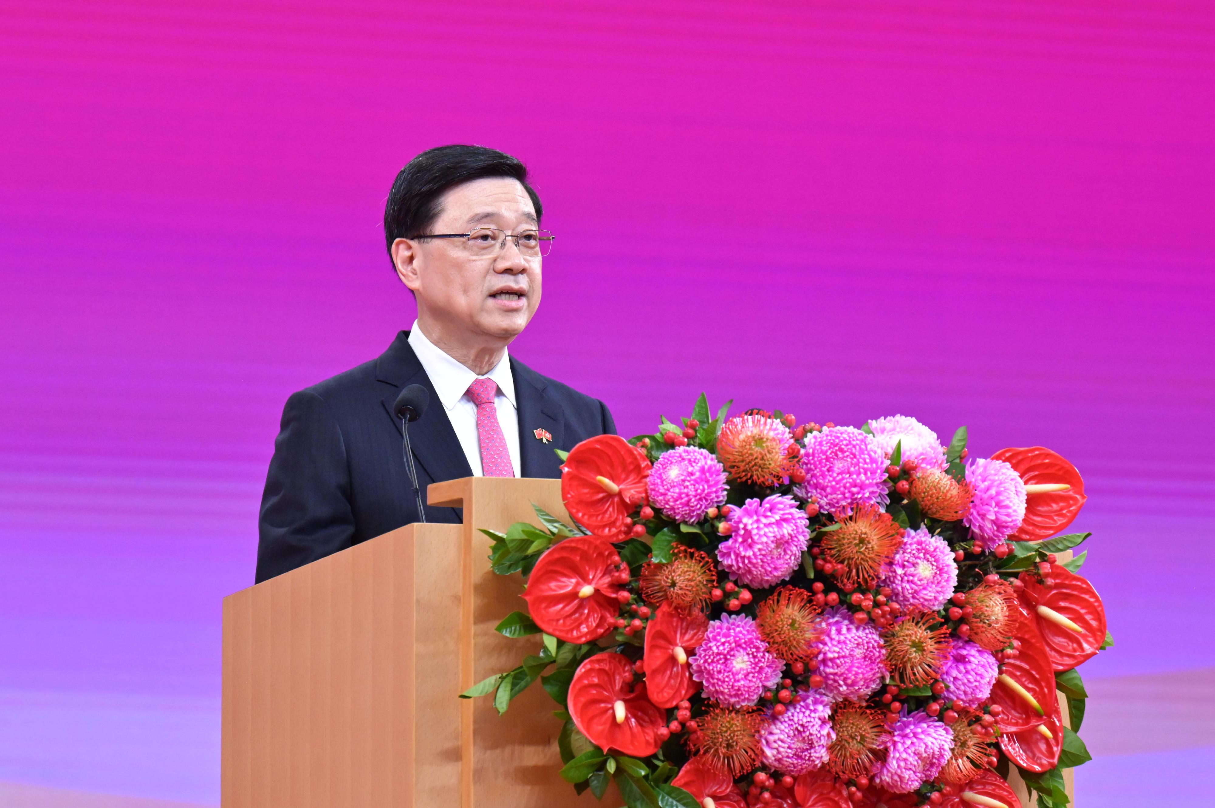 The Chief Executive, Mr John Lee, together with Principal Officials and guests, attended the reception for the 28th anniversary of the establishment of the Hong Kong Special Administrative Region at the Hong Kong Convention and Exhibition Centre this morning (July 1). Photo shows Mr Lee addressing the reception.