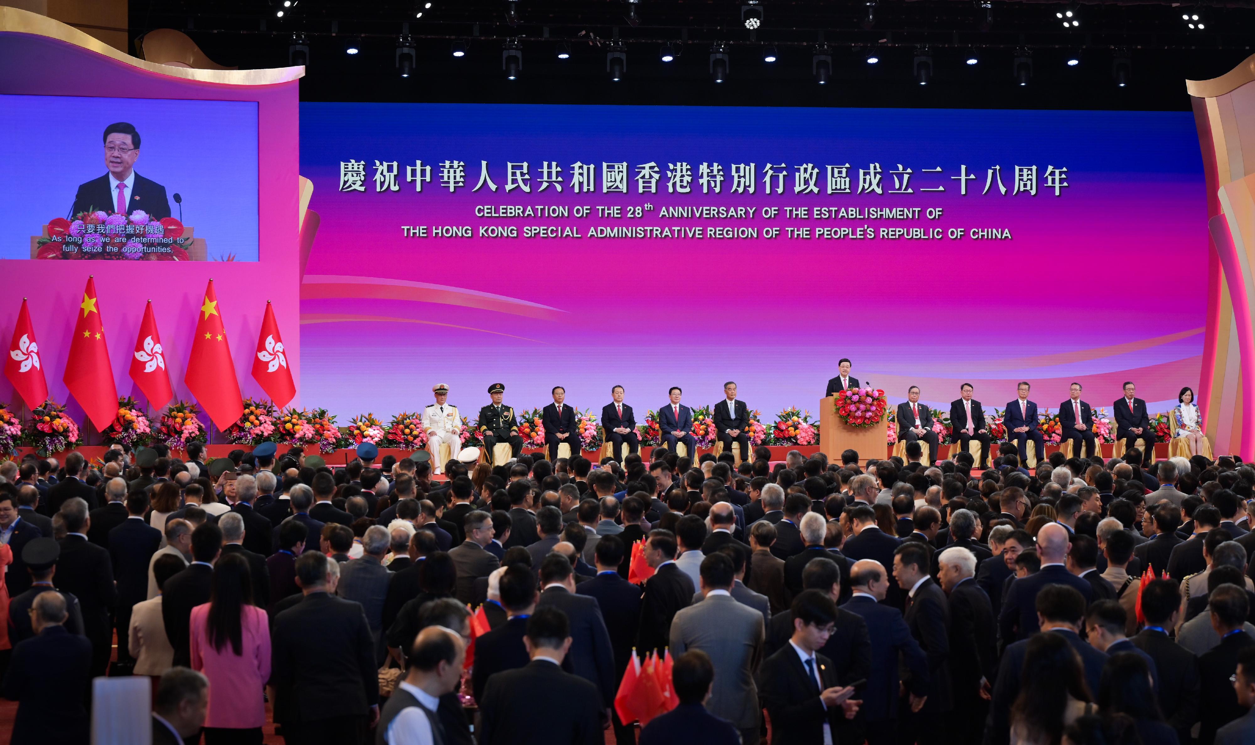 The Chief Executive, Mr John Lee, together with Principal Officials and guests, attends the reception for the 28th anniversary of the establishment of the Hong Kong Special Administrative Region at the Hong Kong Convention and Exhibition Centre this morning (July 1).