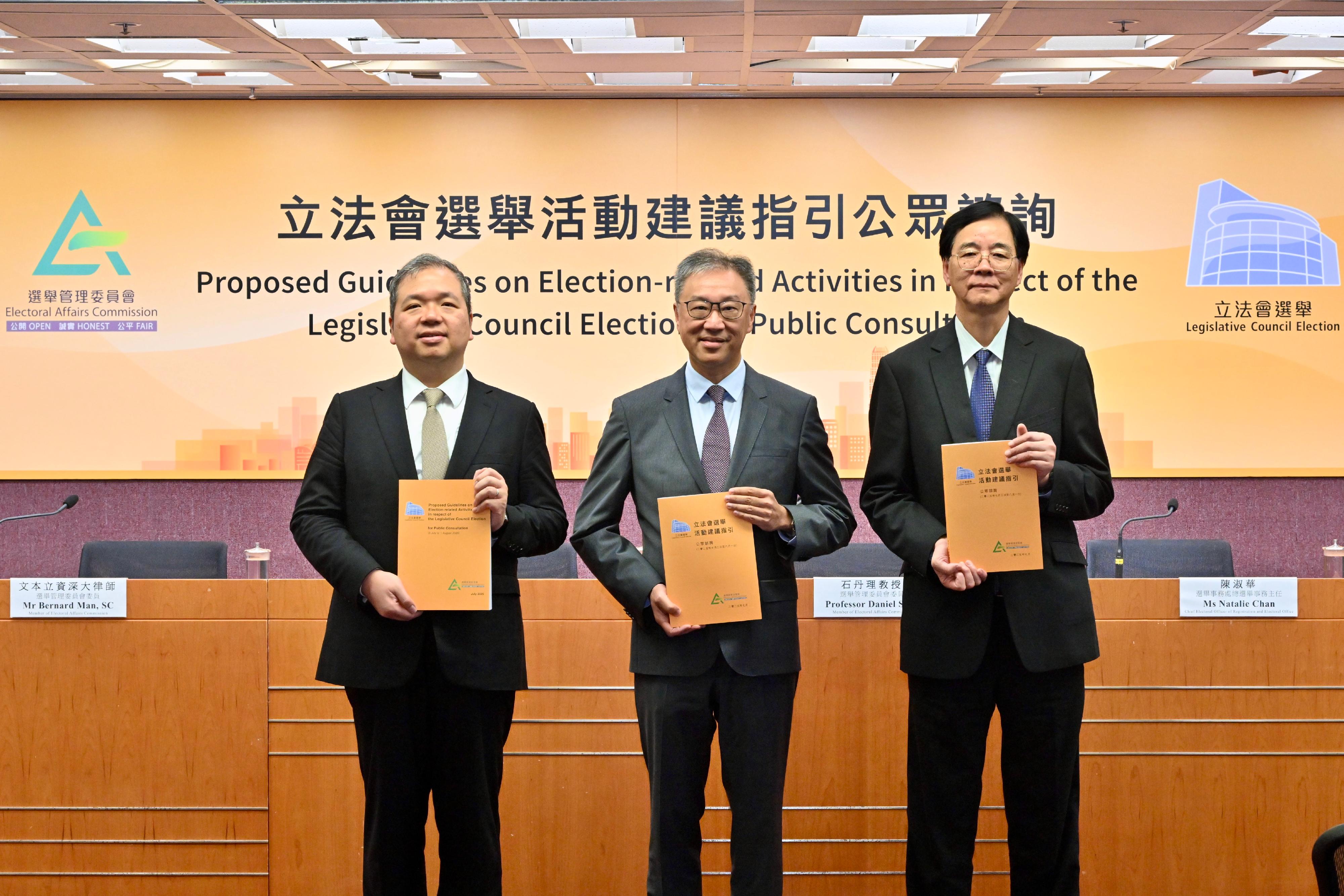 The Chairman of the Electoral Affairs Commission (EAC), Mr Justice David Lok (centre); and EAC members Professor Daniel Shek (right) and Mr Bernard Man, SC (left), presented the public consultation documents on the proposed guidelines on election-related activities in respect of the Legislative Council Election at a press conference today (July 3).