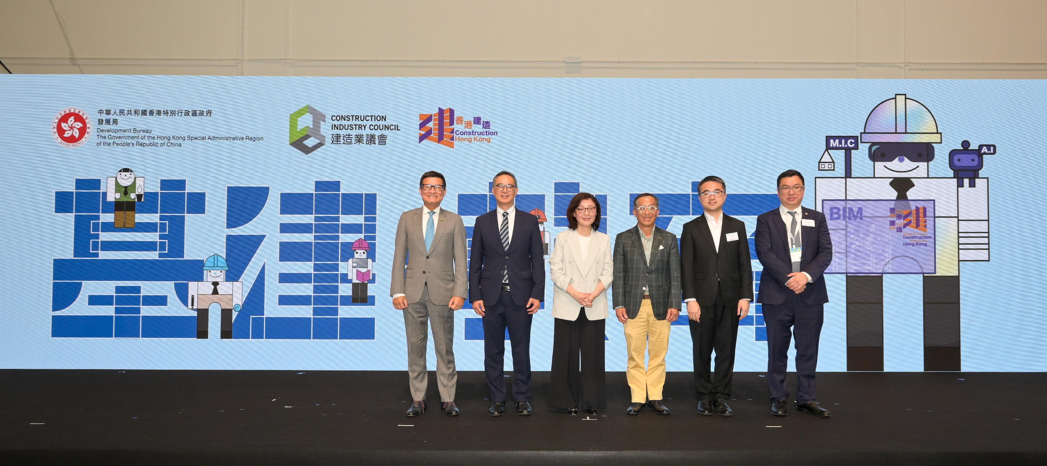 The launching ceremony of the Infrastructure x Education Exhibition and the first phase of achievement of the STEAM UP project, jointly organised by the Development Bureau and the Construction Industry Council (CIC), was held today (July 3). Photo shows the Secretary for Development, Ms Bernadette Linn (third left); the Permanent Secretary for Development (Works), Mr Ricky Lau (second left); the Under Secretary for Education, Dr Sze Chun-fai (second right); the Chairman of the CIC, Professor Thomas Ho (third right); the Executive Director of the CIC, Mr Albert Cheng (first left); and the Executive Director of Hong Kong Education City, Dr Tenny Lam (first right), at the launching ceremony.