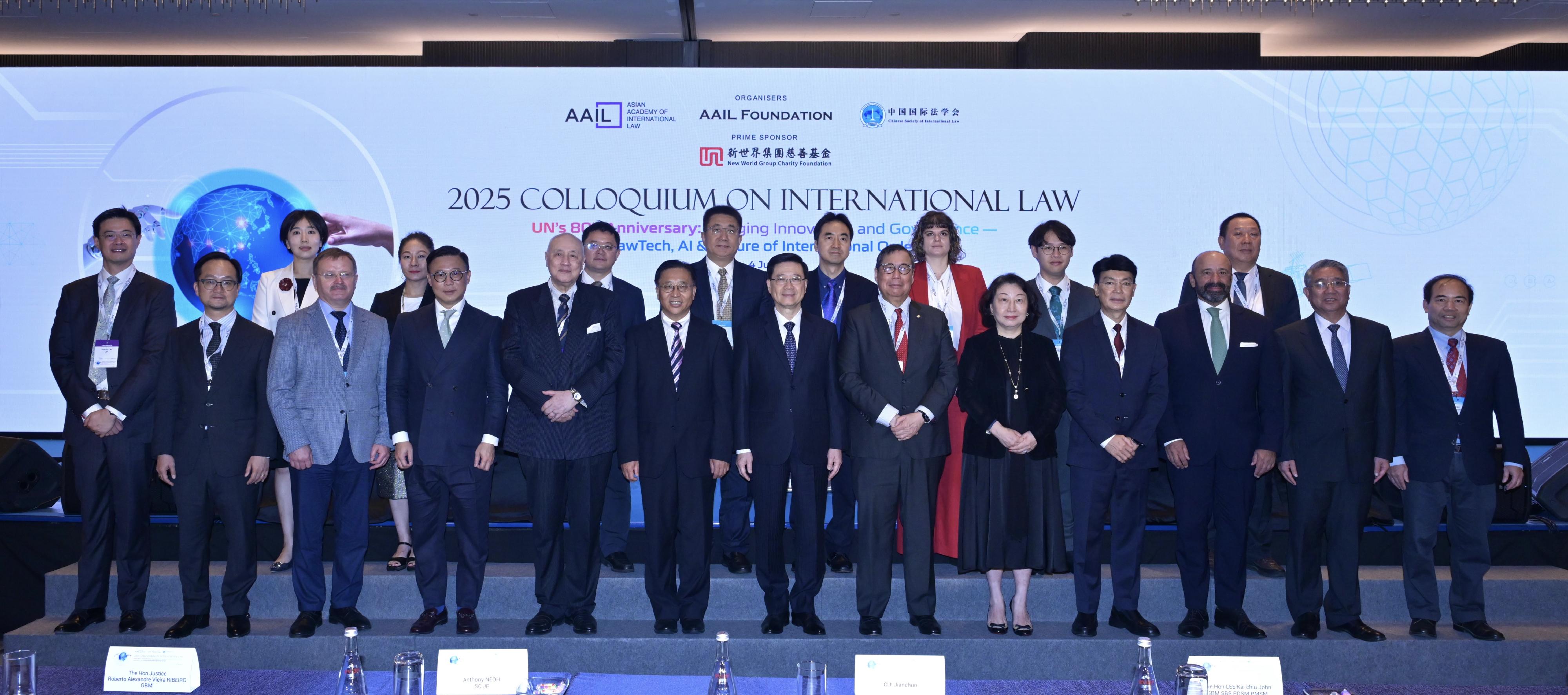 The Chief Executive, Mr John Lee, attended the 2025 Colloquium on International Law today (July 4). Photo shows Mr Lee (front row, centre); the Commissioner of the Ministry of Foreign Affairs of the People's Republic of China in the Hong Kong Special Administrative Region, Mr Cui Jianchun (front row, sixth left); Co-Chairman of the Asian Academy of International Law Professor Teresa Cheng (front row, fifth right); Co-Chairman of the Asian Academy of International Law Dr Anthony Neoh (front row, fifth left), and other guests at the forum.