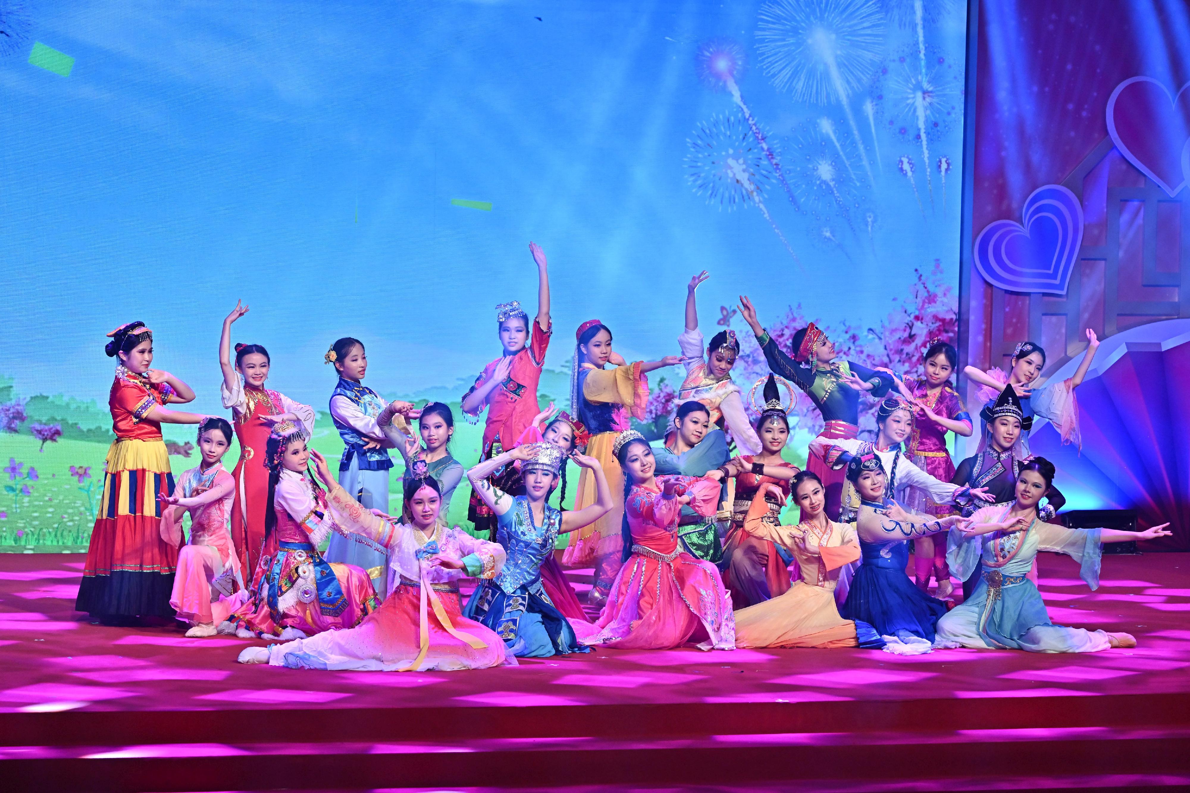 The Education Bureau today (July 4) held the "Love Our Home, Treasure Our Country" Joint Schools National Education Activities Gala, celebrating the fifth anniversary of the implementation of the Hong Kong National Security Law and the 28th anniversary of Hong Kong's return to the motherland. Photo shows students performing a dance.