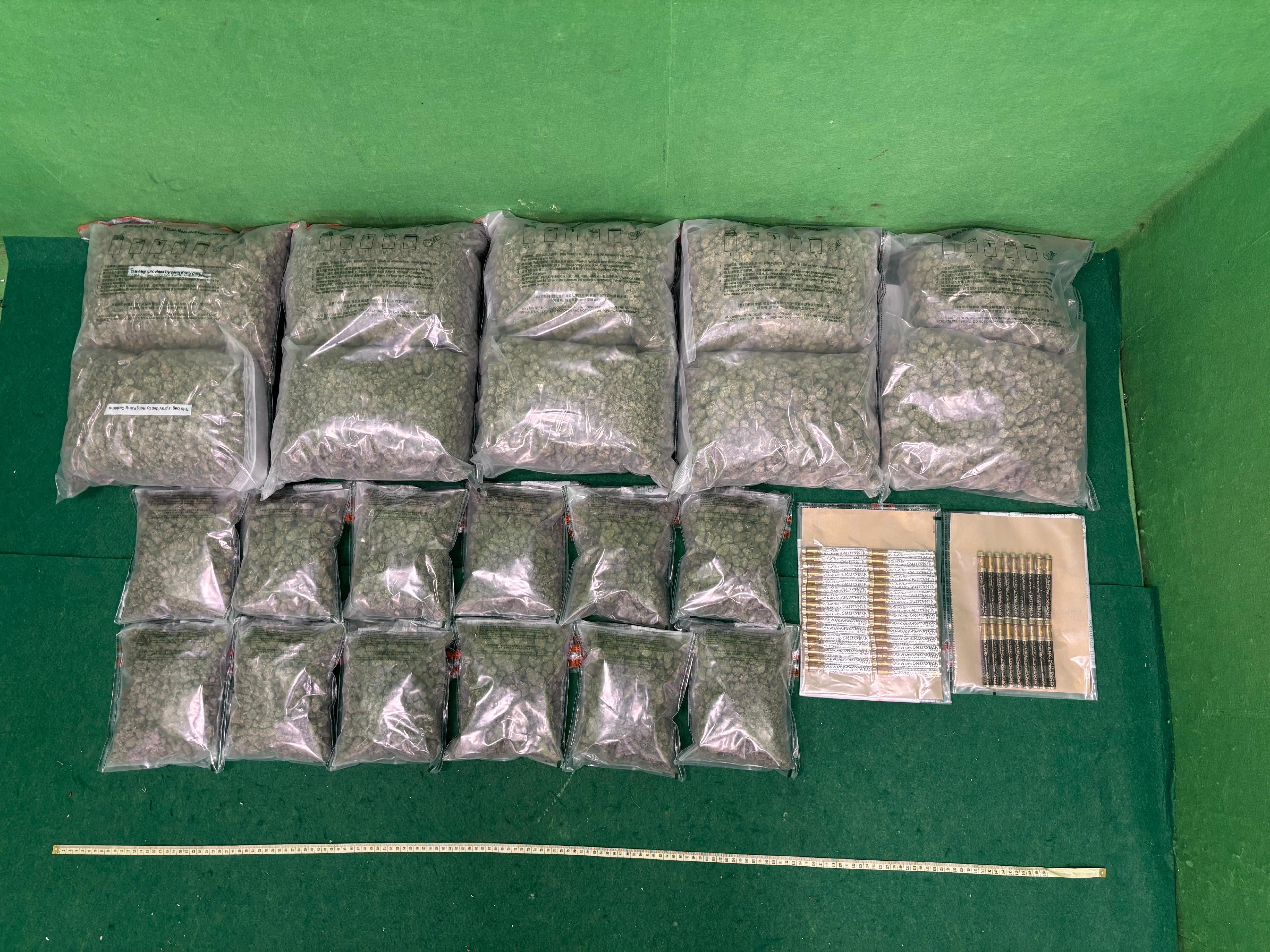 Hong Kong Customs today (July 4) detected a passenger drug trafficking case at Hong Kong International Airport and seized about 11.2 kilograms of suspected cannabis buds and 50 sticks of vapes with suspected cannabis oil with a total estimated market value of about  $2.4 million. One man was arrested. Photo shows the suspected cannabis buds and the vapes with suspected cannabis oil seized.

