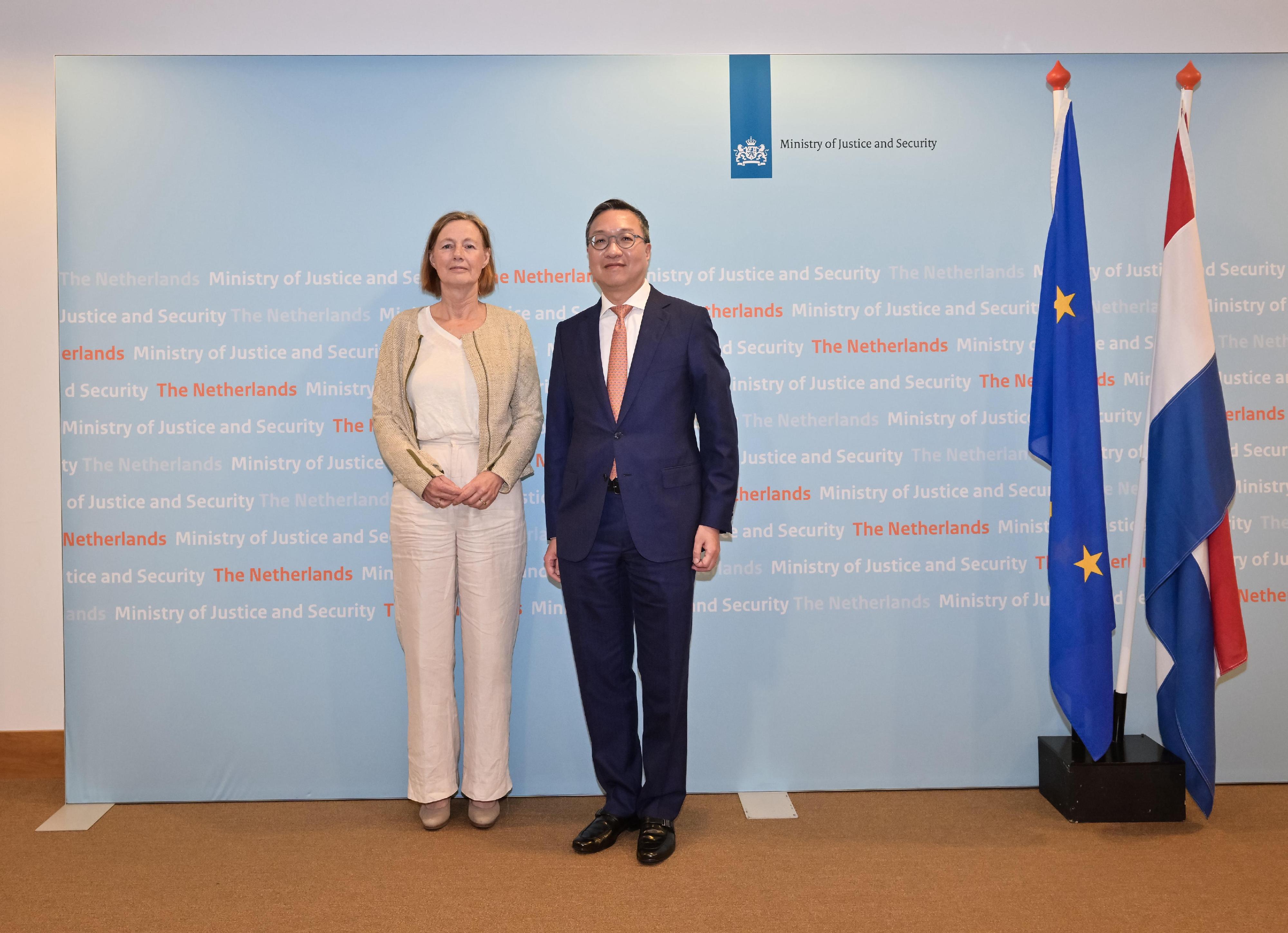 The Secretary for Justice, Mr Paul Lam, SC, visited the Ministry of Justice and Security of the Netherlands on July 7 (The Hague time). Photo shows Mr Lam (right) and the Secretary General of the Ministry of Justice and Security of the Netherlands, Ms Anneke Van Dijk (left), before their meeting.