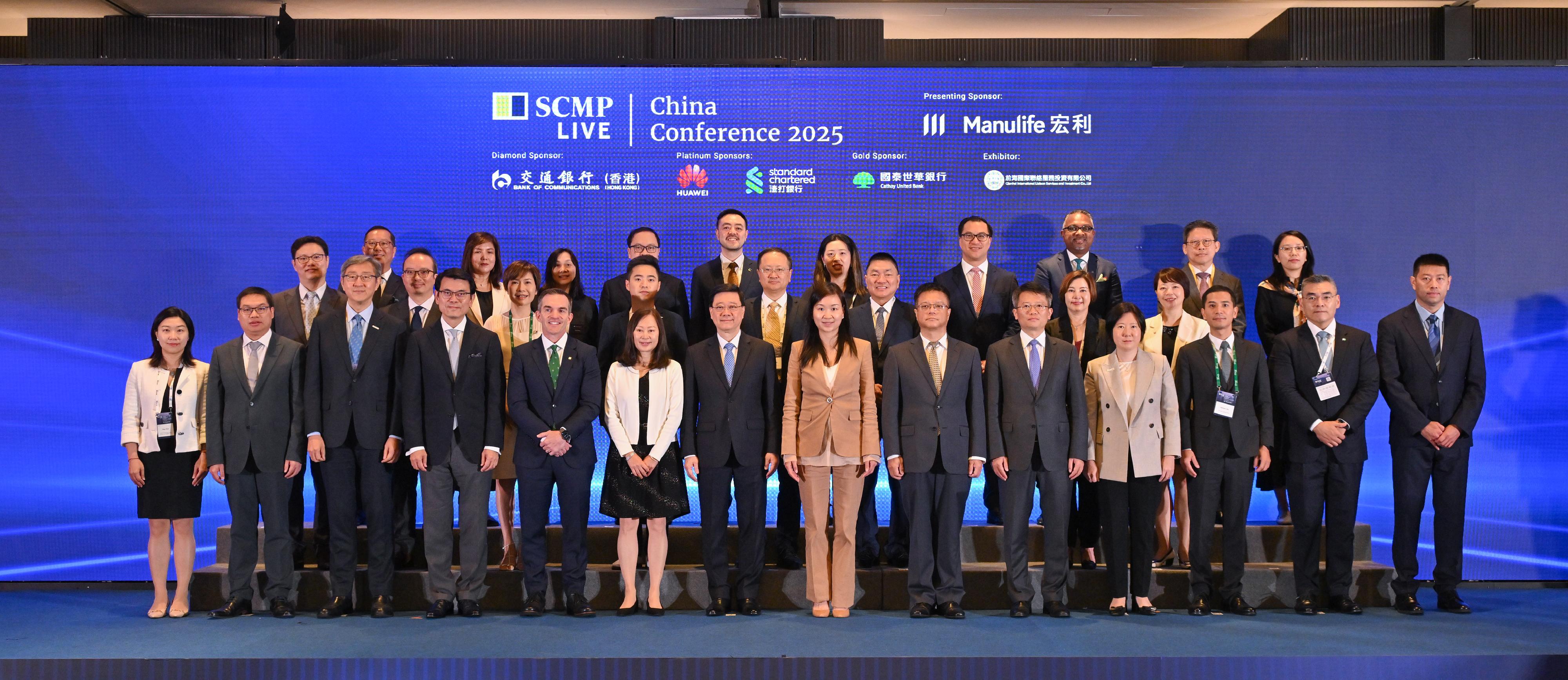 The Chief Executive, Mr John Lee, attended the South China Morning Post China Conference 2025 today (July 8). Photo shows (first row, from fifth left) the President and Chief Executive Officer of Manulife Asia, Mr Steve Finch; the Editor-in-Chief of the South China Morning Post, Ms Tammy Tam; Mr Lee; the Chief Executive Officer of the South China Morning Post, Ms Catherine So, and other guests at the conference.
