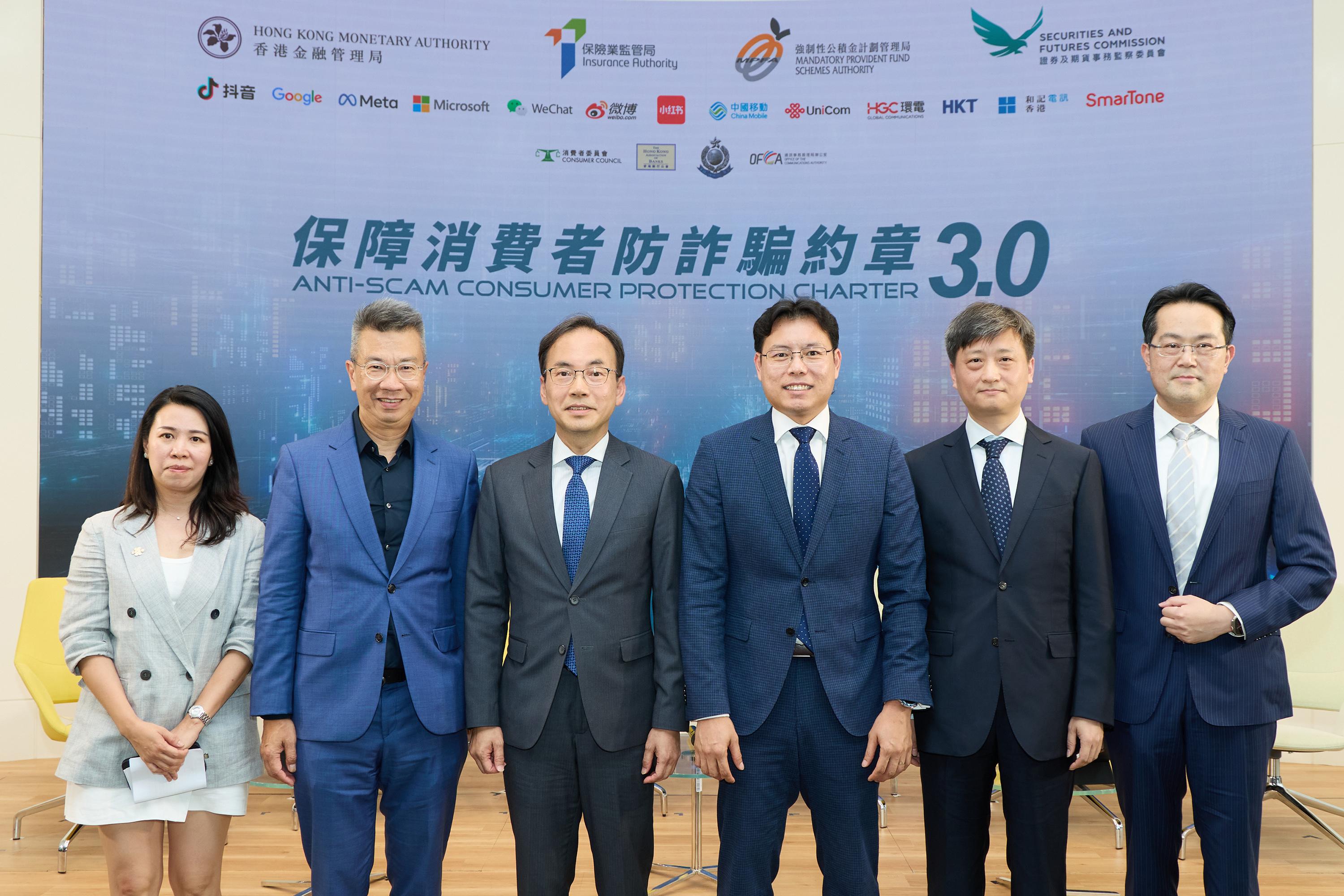 Photo shows (from left) Vice President of Mobile Business Department of the China Unicom (Hong Kong) Operations Limited, Ms Alice Au; the Chief Executive Officer, Consumer of the HKT, Mr Bruce Lam; the Director-General of Communications of the Office of the Communications Authority, Mr Chaucer Leung; the Chief Technology Officer of Hutchison Telecommunications (Hong Kong) Limited, Mr Damien Leong; Director and Executive Vice President, Chief Compliance Officer of China Mobile Hong Kong, Mr Dayue Wang; and the Chief Digital Officer of SmarTone, Mr Gemini Wong, participating a panel discussion at the launch event of the Anti-Scam Consumer Protection Charter 3.0 today (9 July).