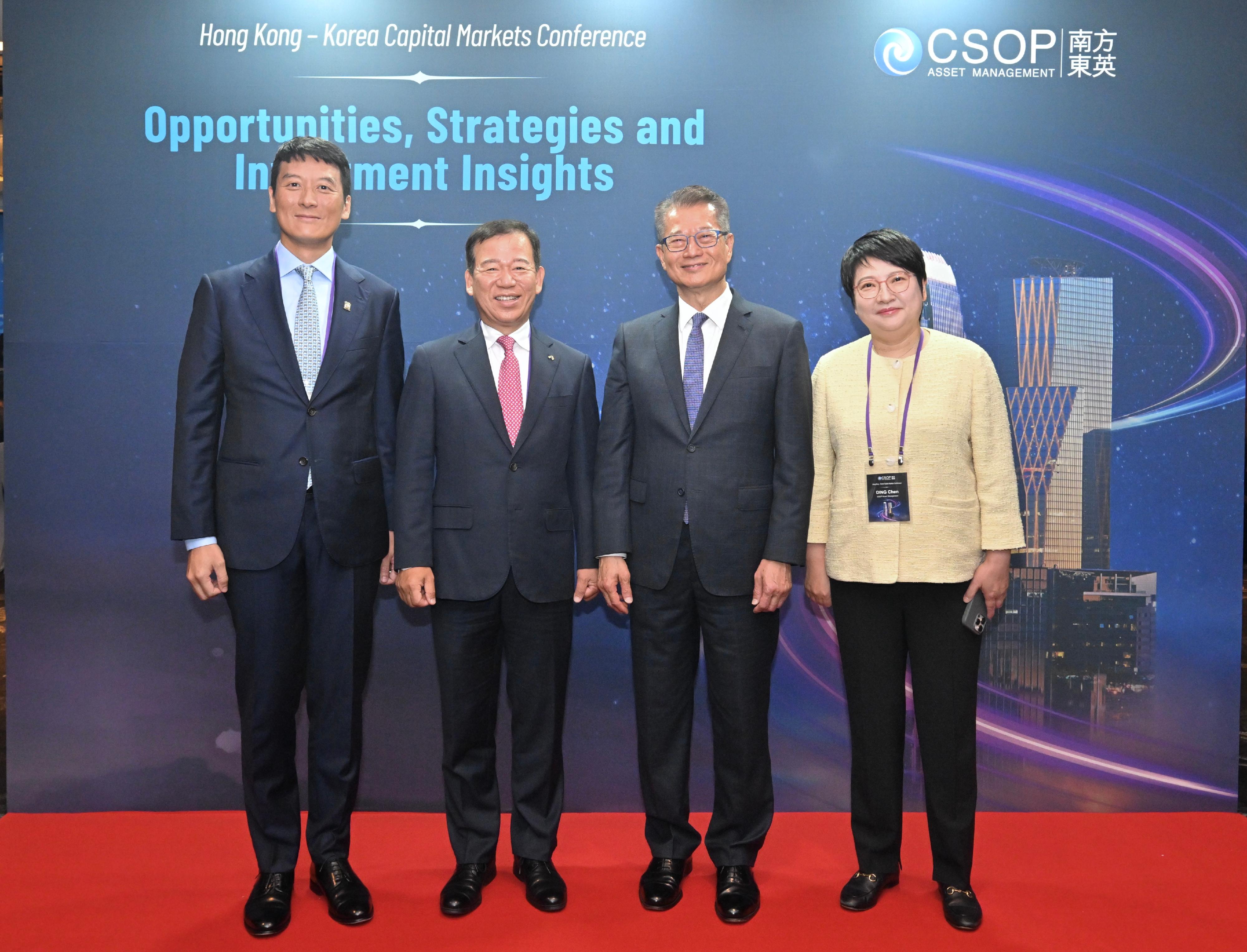 The Financial Secretary, Mr Paul Chan, attended the Hong Kong - Korea Capital Markets Conference today (July 9) in Seoul, Korea. Photo shows Mr Chan in a group photo with other speakers at the Conference, including (from left) the Managing Director and Head of Markets of the Hong Kong Exchanges and Clearing Limited, Mr Gregory Yu; the Chairman of the Korea Financial Investment Association, Mr Seo Yoo-seok; Mr Chan; and the Chief Executive Officer of CSOP Asset Management Limited, Ms Ding Chen.