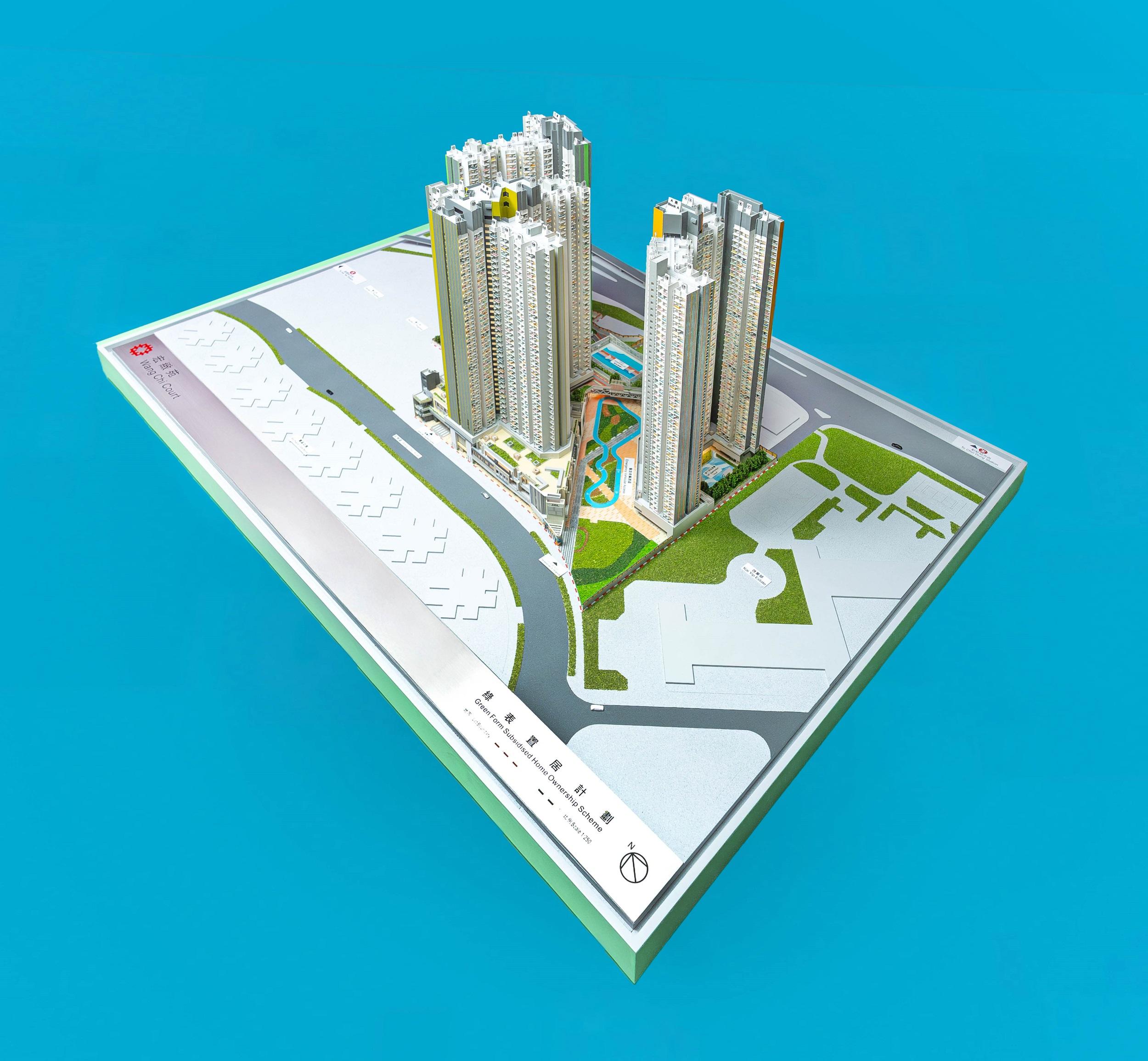 Applications for the Sale of Green Form Subsidised Home Ownership Scheme Flats 2024 will start on July 17. Photo shows a model of Wang Chi Court, a new development under the scheme.
