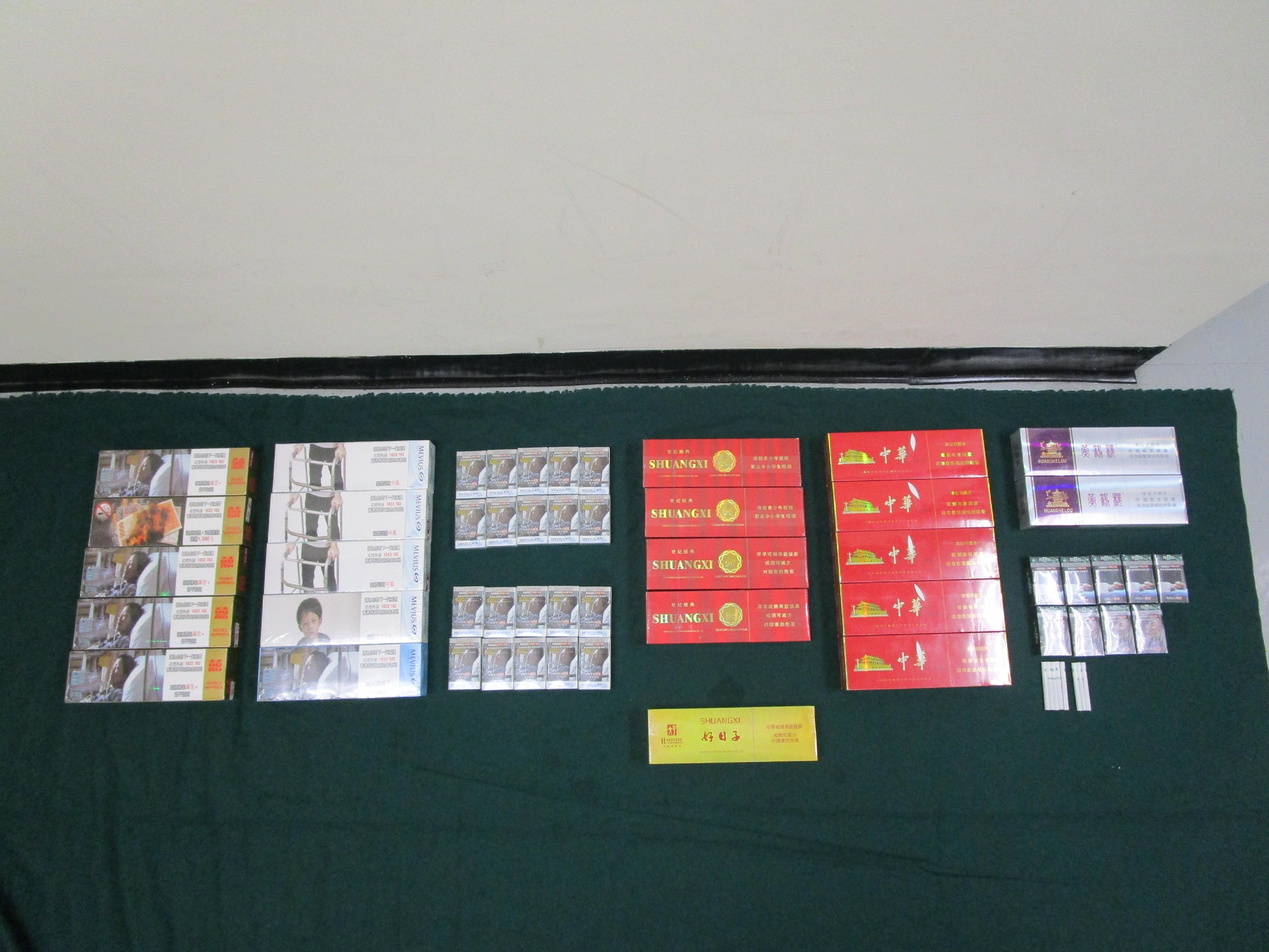 An incoming 45-year-old female passenger was sentenced to three months' imprisonment at the Fanling Magistrates' Courts today (July 9) for possessing duty-not-paid cigarettes and failing to declare to Customs Officers, in contravention of the Dutiable Commodities Ordinance. Photo shows the duty-not-paid cigarettes seized.
