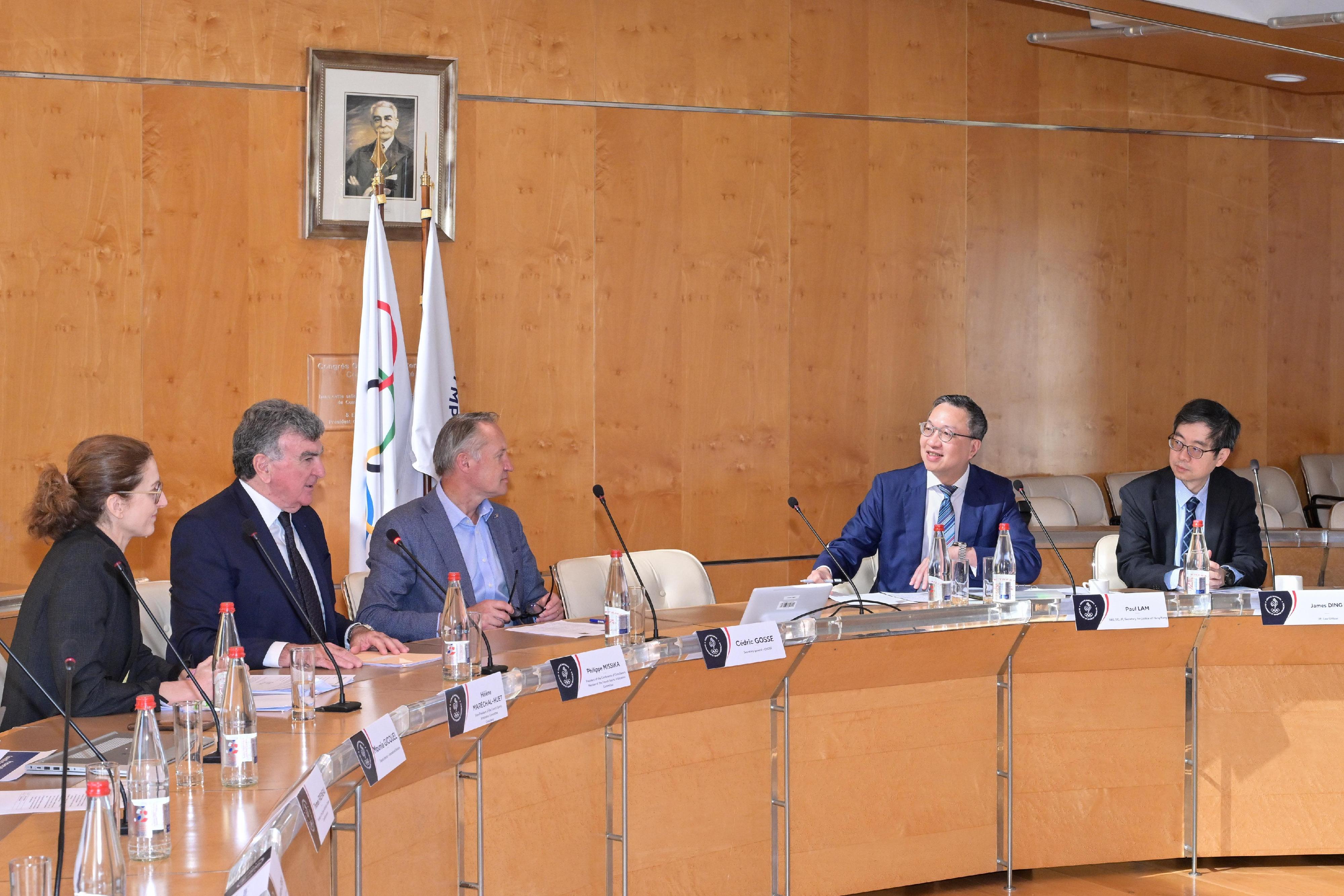 The Secretary for Justice, Mr Paul Lam, SC, visited the French National and Olympic Sports Committee (CNOSF) on July 9 (Paris time). Photo shows Mr Lam (second right) meeting with the Secretary General of the CNOSF, Mr Cédric Gosse (third left); and the President of the Conference of Conciliators and member of the Chamber of Arbitration for Sport (or Sport Arbitration Chamber) of the CNOSF, Mr Philippe Missika (second left).
