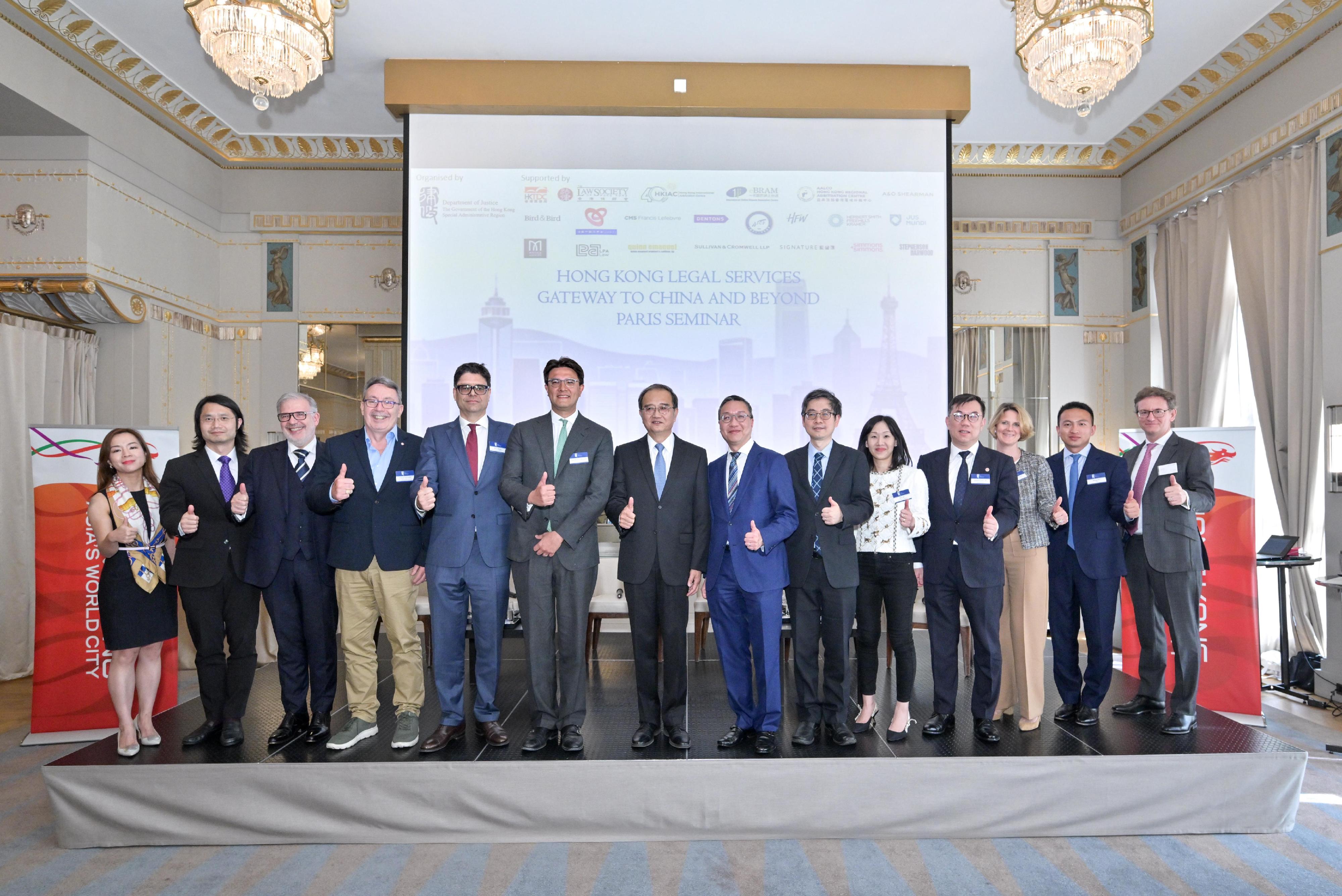 The Secretary for Justice, Mr Paul Lam, SC, attended the Paris Seminar entitled "Hong Kong Legal Services – Gateway to China and Beyond" organised by the Department of Justice (DoJ) in Paris on July 9 (Paris time). Photo shows Mr Lam (seventh right), the Ambassador Extraordinary and Plenipotentiary of the People's Republic of China to the French Republic, Mr Deng Li (seventh left), the Law Officer (International Law) of the DoJ, Dr James Ding (sixth right) and other panel speakers at the seminar.