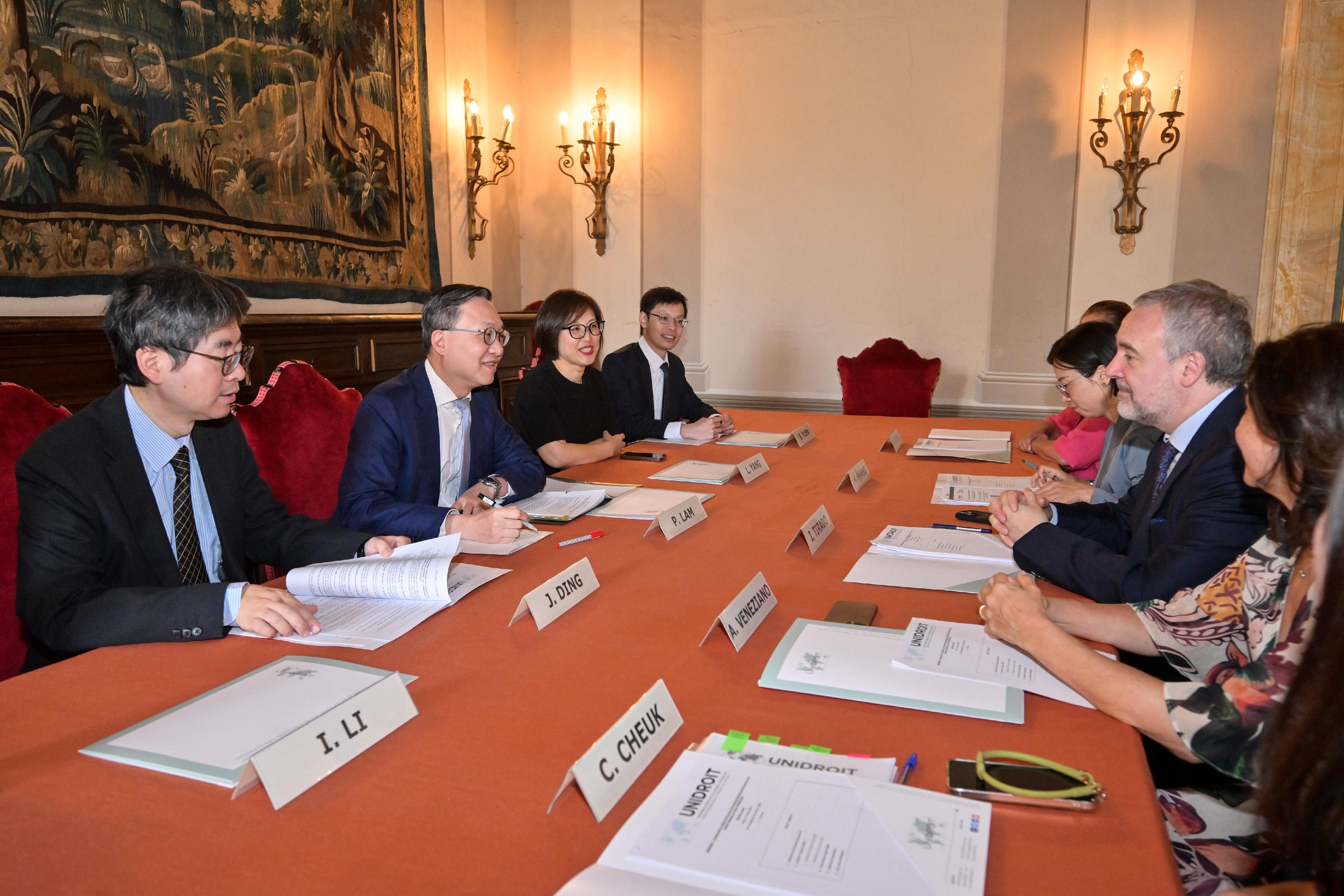 The Secretary for Justice, Mr Paul Lam, SC, continued his European visit in Rome, Italy, on July 10 (Rome time) and visited the International Institute for the Unification of Private Law (UNIDROIT). Photo shows Mr Lam (second left); the Law Officer (International Law) of the Department of Justice (DoJ), Dr James Ding (first left); and the  Director of the Hong Kong International Legal Talents Training Office of the DoJ, Dr Yang Ling (third left), meeting with the Secretary-General of UNIDROIT, Professor Ignacio Tirado (second right).
