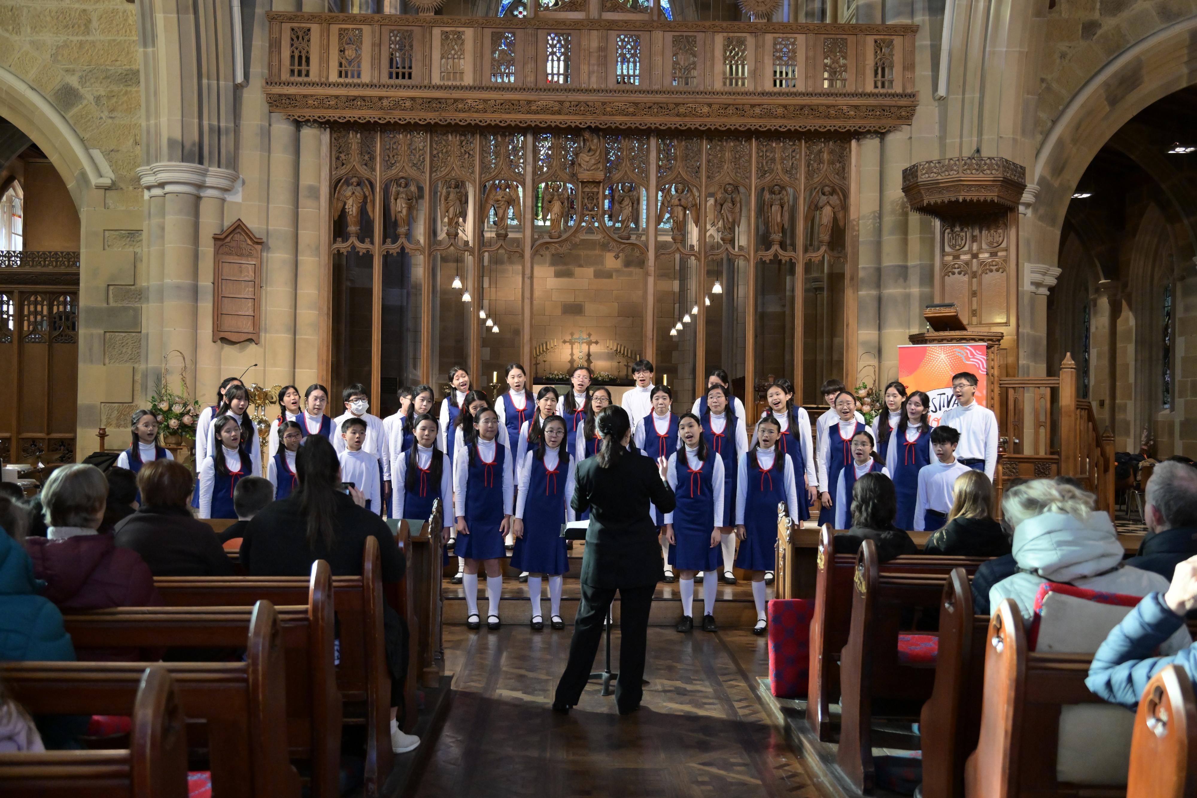 The Hong Kong Economic and Trade Office, Sydney supported the Hong Kong Children's Choir (HKCC) in presenting a series of performances and cultural exchange programmes across Australia and New Zealand in July to promote Hong Kong's vibrant art and culture scene and showcase the artistic excellence of Hong Kong's youth. Photo shows the HKCC performing at the Festival of Voices lunchtime concert at the St David's Cathedral in Hobart on July 4.