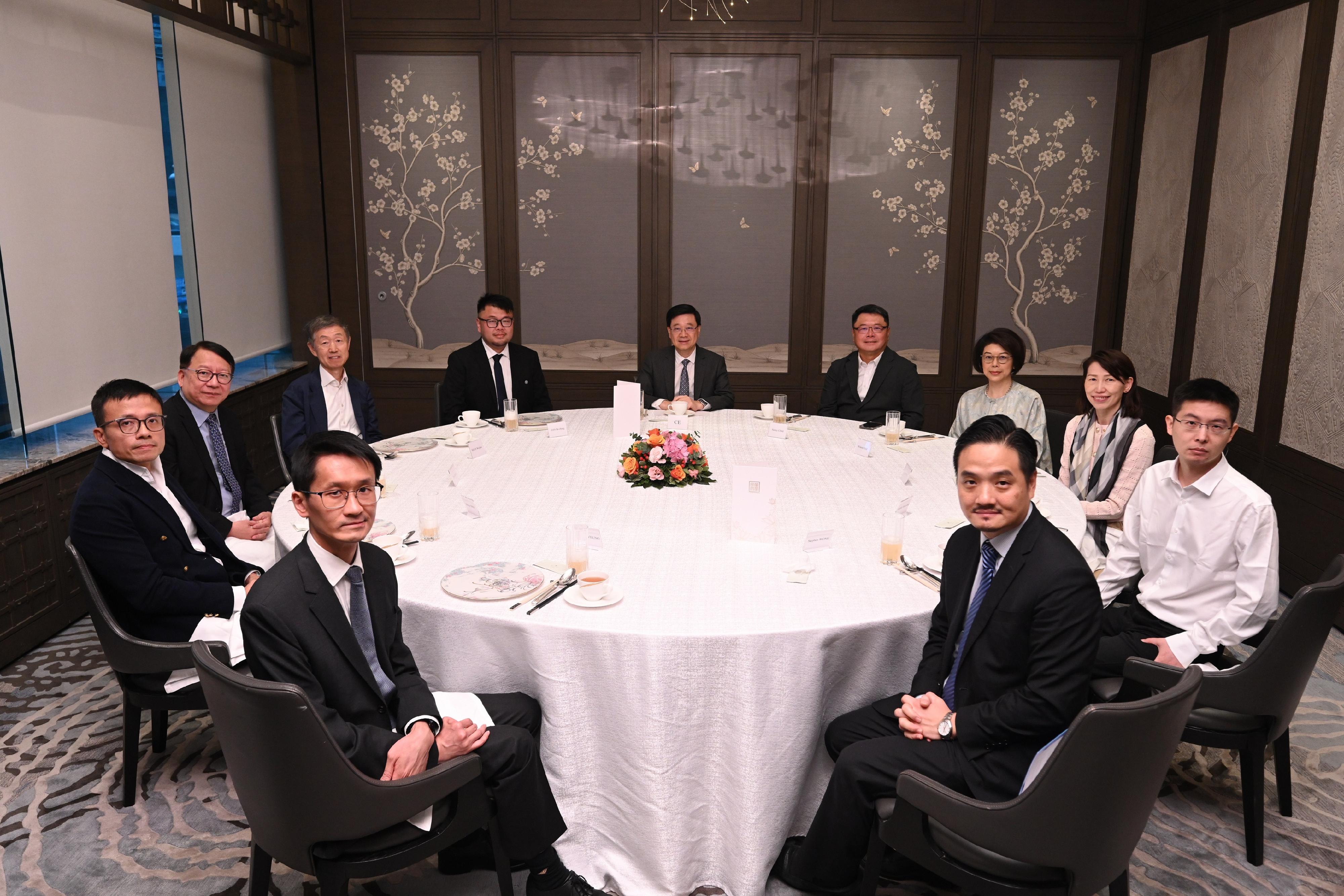 The Chief Executive, Mr John Lee, hosted luncheon meetings of the Chief Executive's Council of Advisers (CECA) to listen to views expressed by CECA members for the forthcoming Policy Address. Photo shows the second session held on July 10.
