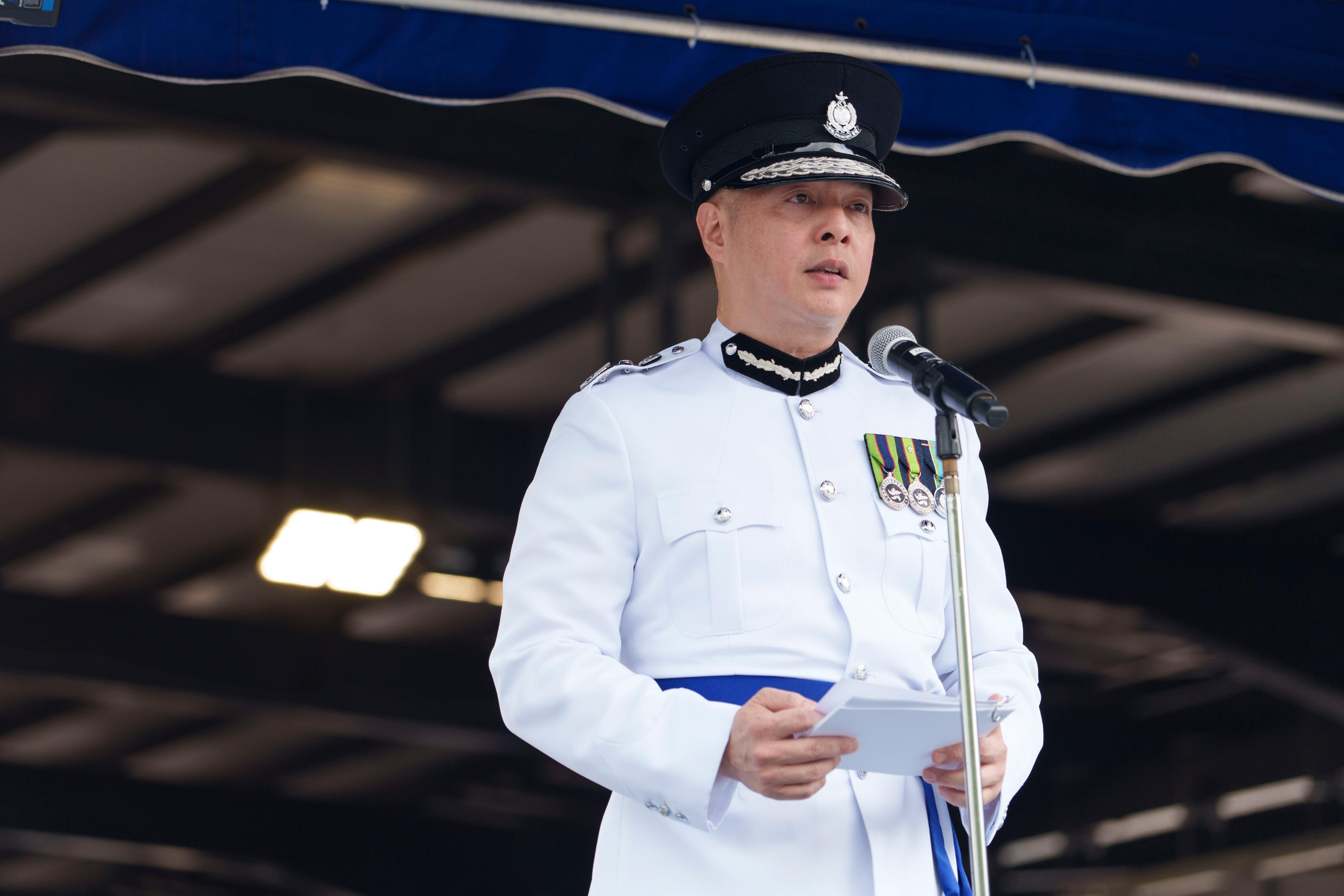 The Commissioner of Police, Mr Chow Yat-ming, speaks at a passing-out parade held at the Hong Kong Police College today (July 12).