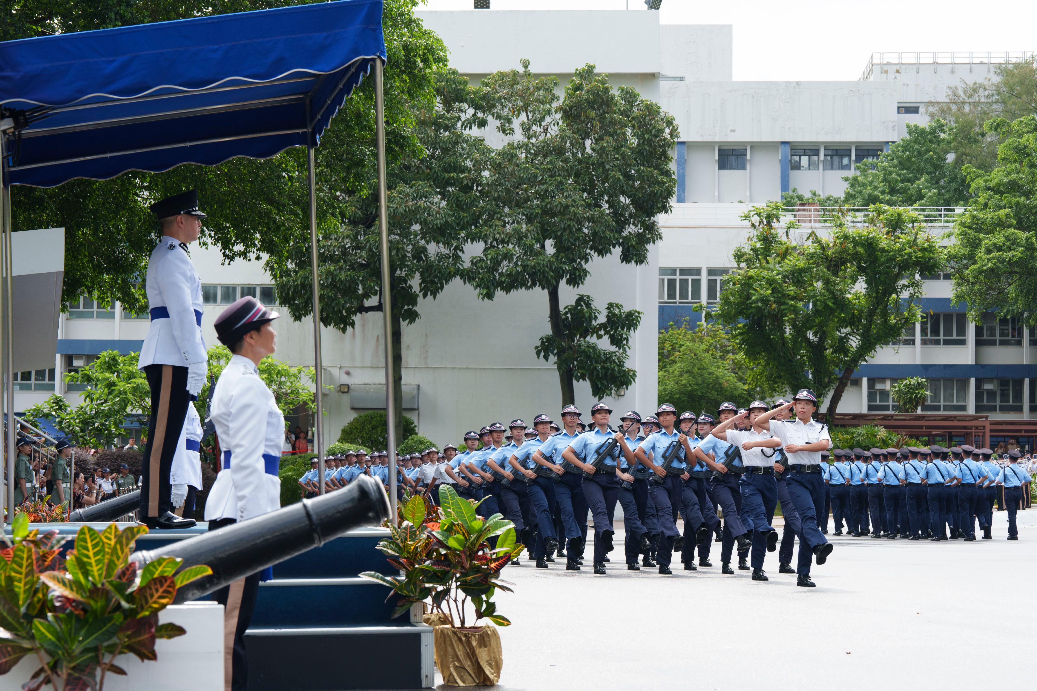The Commissioner of Police, Mr Chow Yat-ming, today (July 12) inspects a passing-out parade of 43 probationary inspectors and 219 recruit police constables at the Hong Kong Police College.
