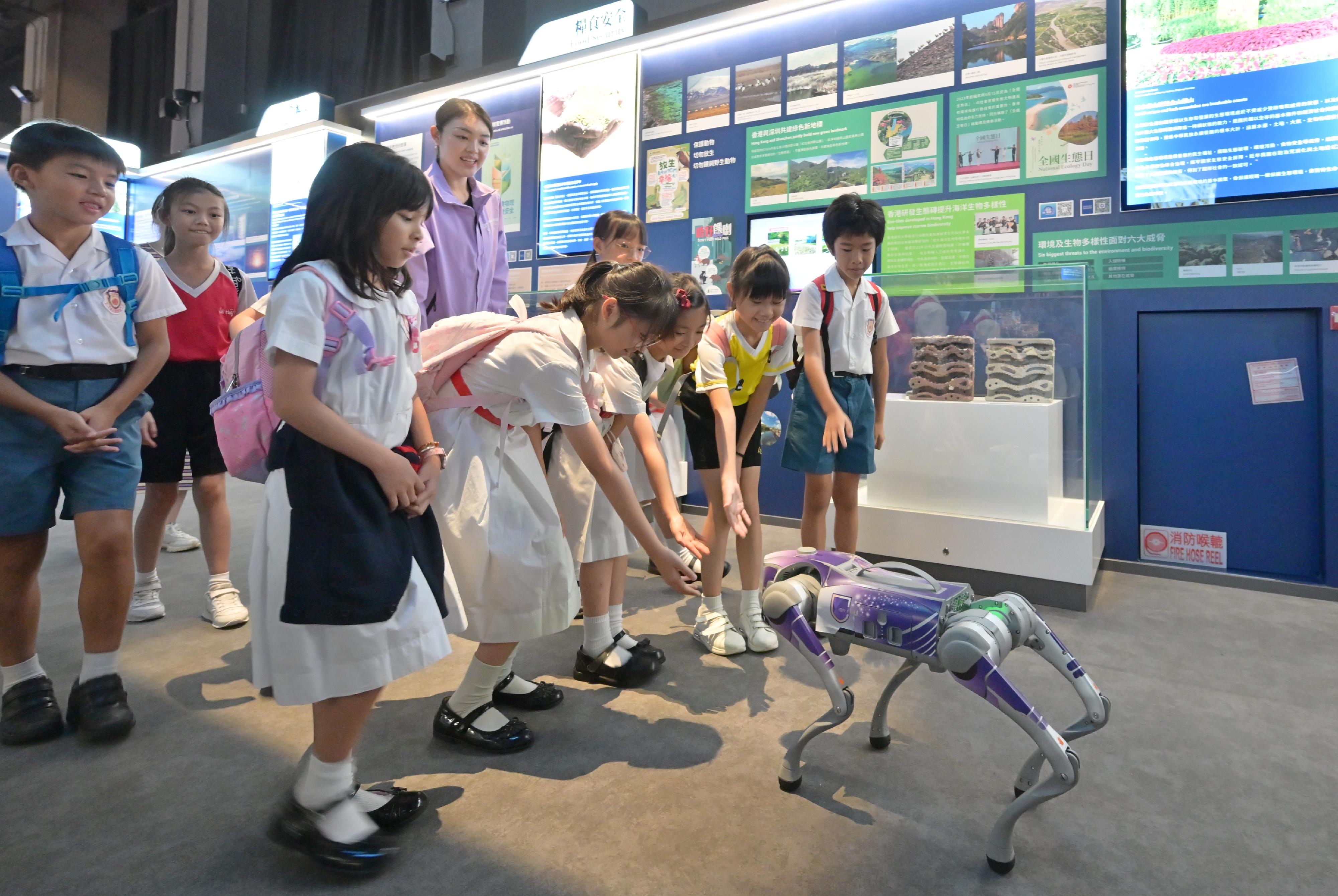 The one-millionth visitor to the National Security Exhibition Gallery interacted with the robotic dog in the Gallery.