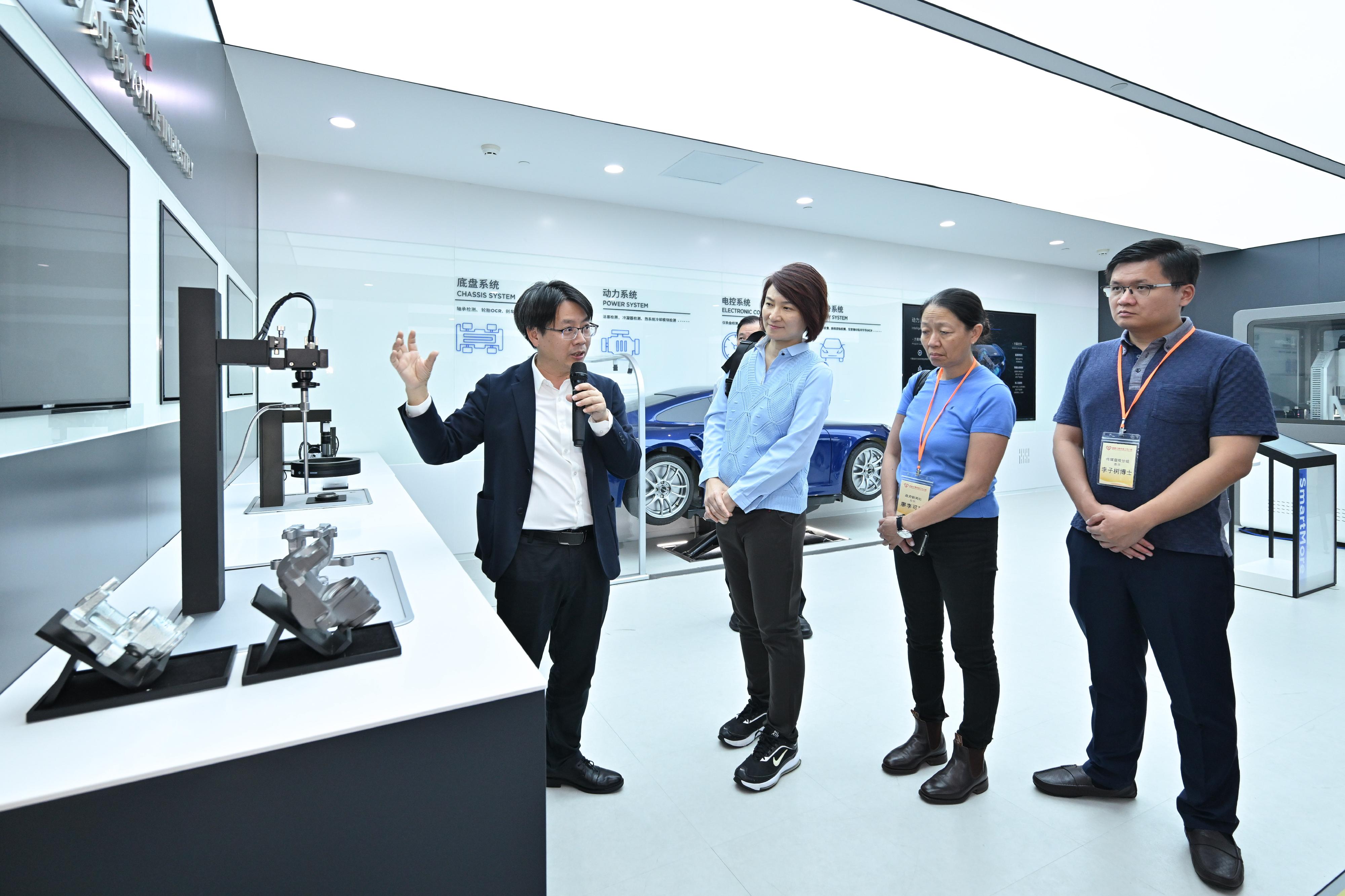 The Working Group on Patriotic Education under the Constitution and Basic Law Promotion Steering Committee organised a two-day exchange tour to the Guangdong-Hong Kong-Macao Greater Bay Area (GBA) on July 12 and 13 to visit various enterprises and places in Shenzhen and Dongguan to learn more about culture and history of the GBA, as well as the latest developments in areas such as innovation and technology and industrialisation. Photo shows the delegation visiting SmartMore Corporation Limited, which was founded by a Hong Kong entrepreneur, and learning about the company's developments in artificial intelligence.