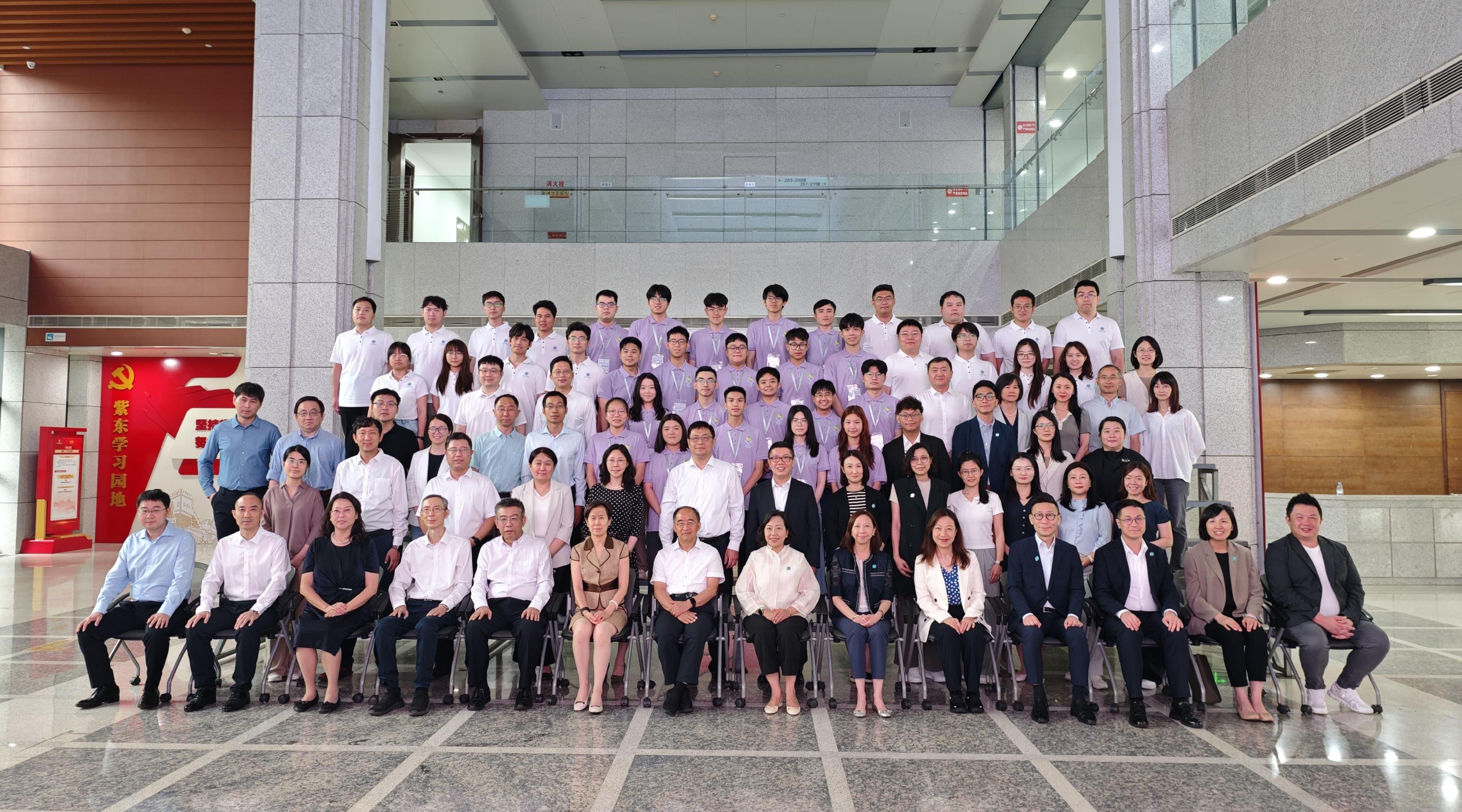 The Secretary for Home and Youth Affairs, Miss Alice Mak, continued her visit to Beijing today (July 15). Photo shows Miss Mak (front row, seventh right); Senior official of the Bureau of the Academic Divisions of the Chinese Academy of Sciences Mr Zhou Dejin (front row, seventh left); Deputy Director-General of the Bureau of International Cooperation of the Chinese Academy of Sciences Ms Yan Wu (front row, sixth left); the Permanent Secretary for Home and Youth Affairs, Ms Shirley Lam (front row, sixth right); the Director of Home Affairs, Ms Priscilla To (front row, fifth right); and the Deputy Secretary for Home and Youth Affairs (Home Affairs), Mr Paul Wong (front row, fourth right), with youth participating in the Youth Internship Programme at Chinese Academy of Sciences.