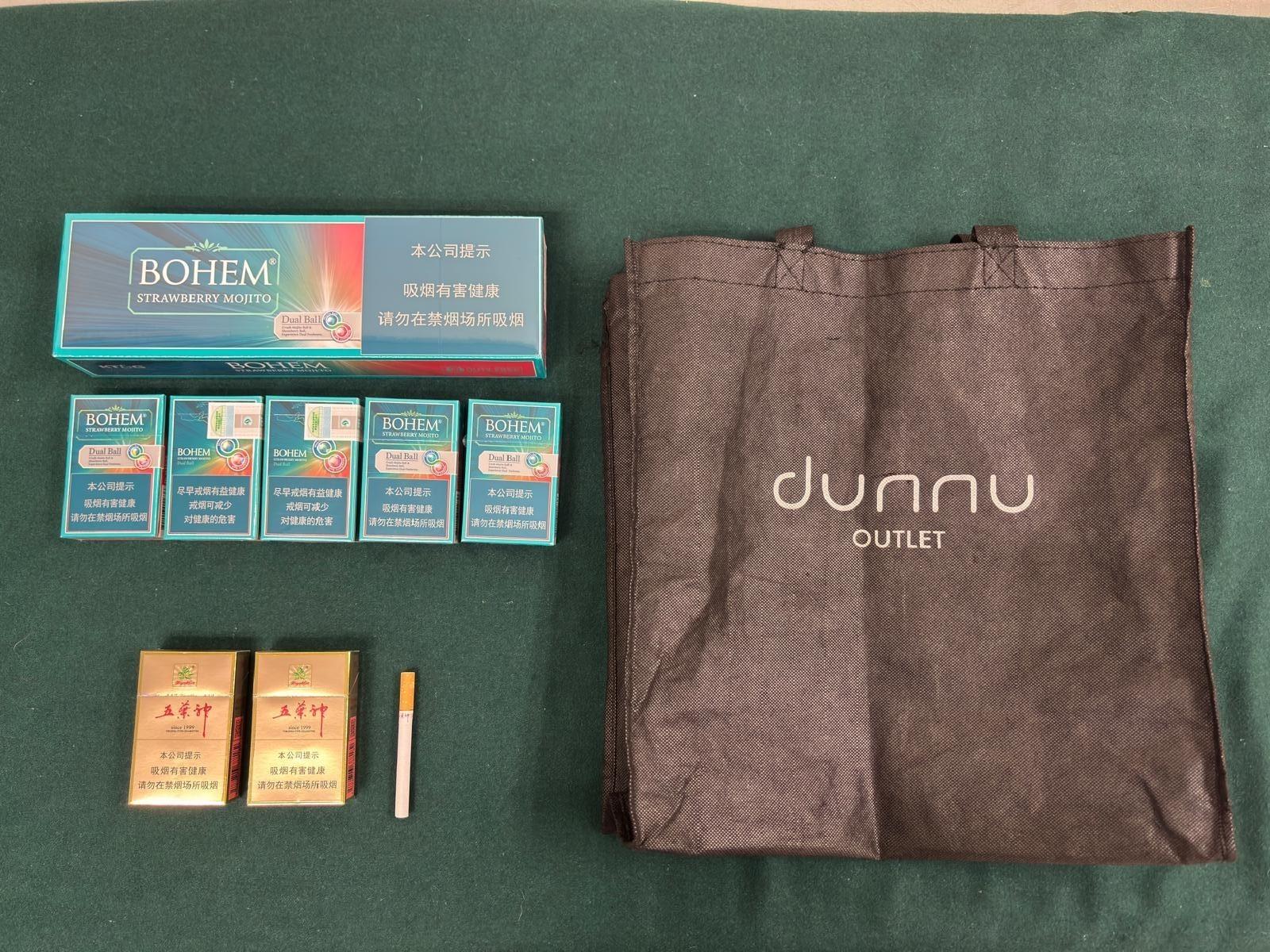 An incoming 77-year-old female passenger was sentenced to four weeks' imprisonment and fined $1,000 at the Fanling Magistrates' Courts today (July 15) for possessing 341 duty-not-paid cigarettes and failing to declare them to Customs officers at the Lok Ma Chau Spur Line Control Point, in contravention of the Dutiable Commodities Ordinance. Photo shows the duty-not-paid cigarettes seized.
