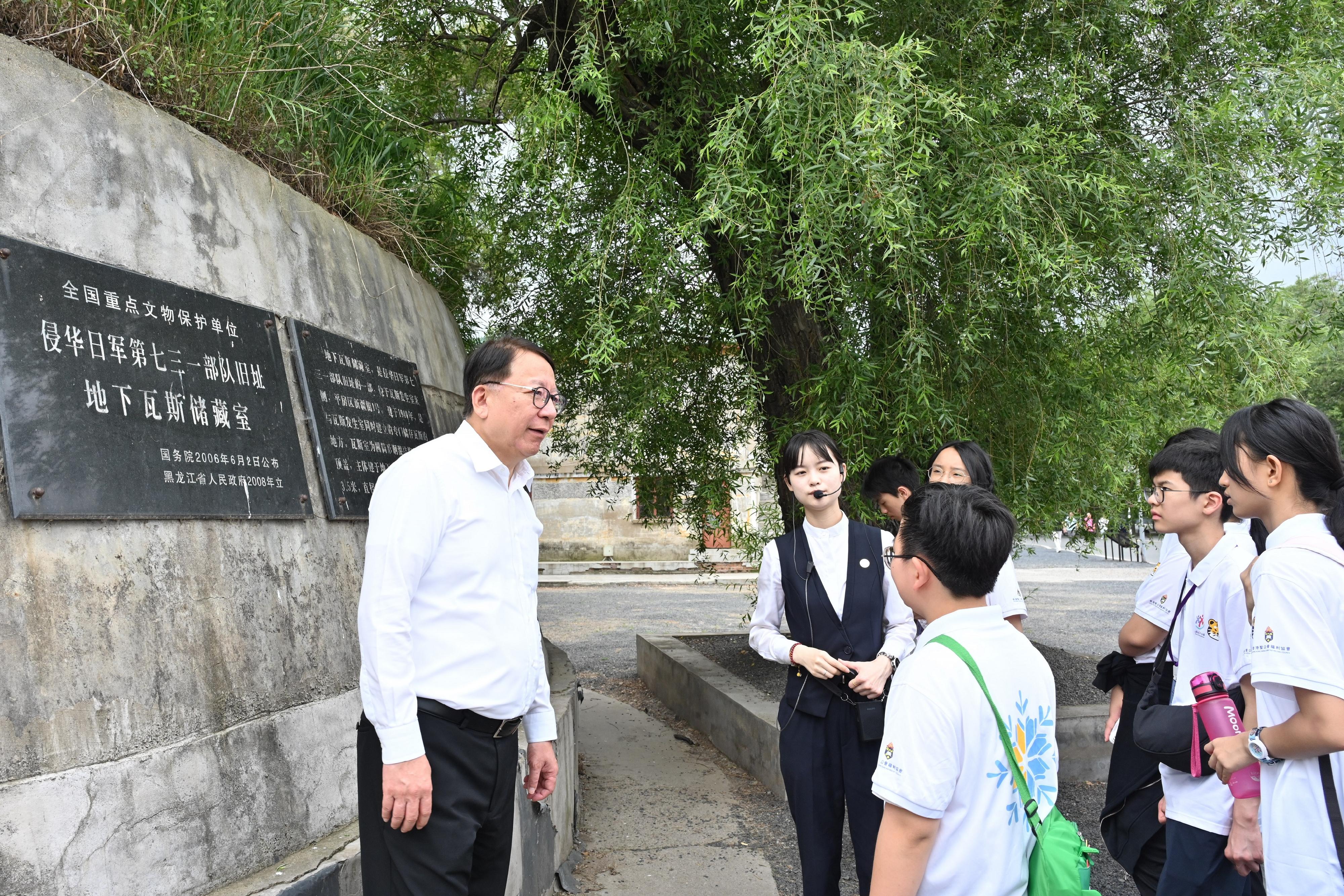 The Chief Secretary for Administration, Mr Chan Kwok-ki, continued his visit to Heilongjiang Province today (July 16). Photo shows Mr Chan (first left) and members of the Hong Kong Patriotic Education Heilongjiang Study Tour under the Strive and Rise Programme visiting the Exhibition Hall of Evidences of Crime Committed by Unit 731 of the Japanese Imperial Army.
