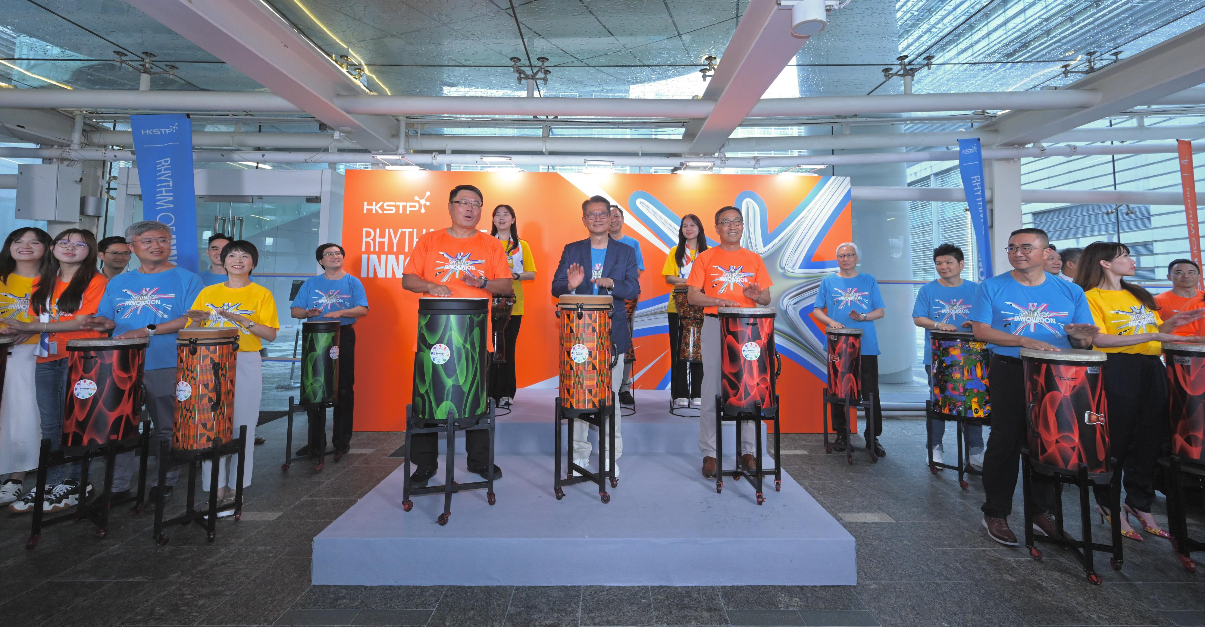 The Financial Secretary, Mr Paul Chan, attended Rhythm of Innovation today (July 18). Photo shows (front row, from third left) the Chairman of the Hong Kong Science and Technology Parks (HKSTP) Corporation, Dr Sunny Chai; Mr Chan, and the Chief Executive Officer of the HKSTP, Mr Albert Wong, officiating at the event.