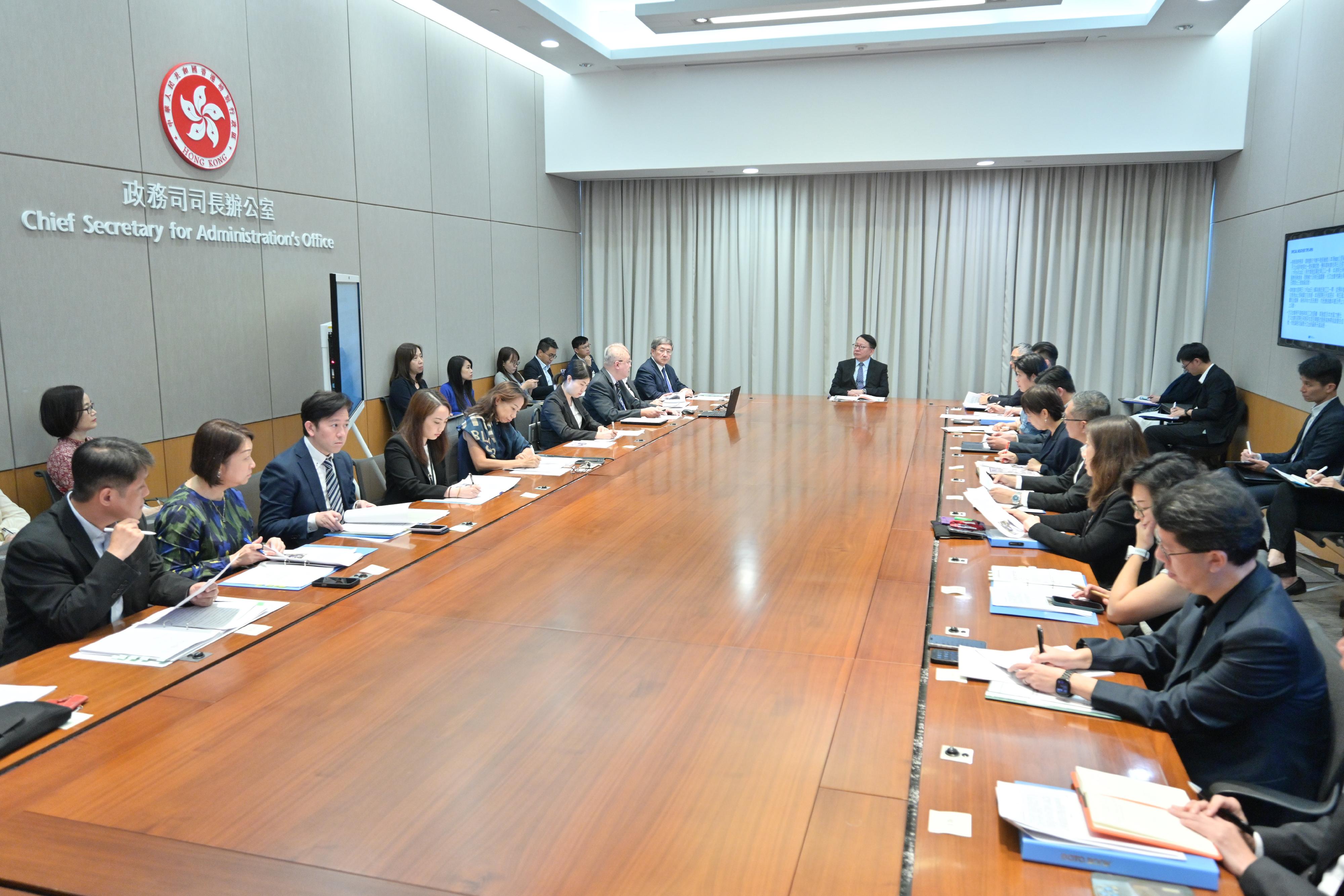 The Chief Secretary for Administration, Mr Chan Kwok-ki (centre), chaired a meeting of the steering committee on inter-departmental handling of typhoons this afternoon (July 18) to ensure comprehensive and adequate preparations and response planning by relevant departments to cope with possible threats of Wipha.
