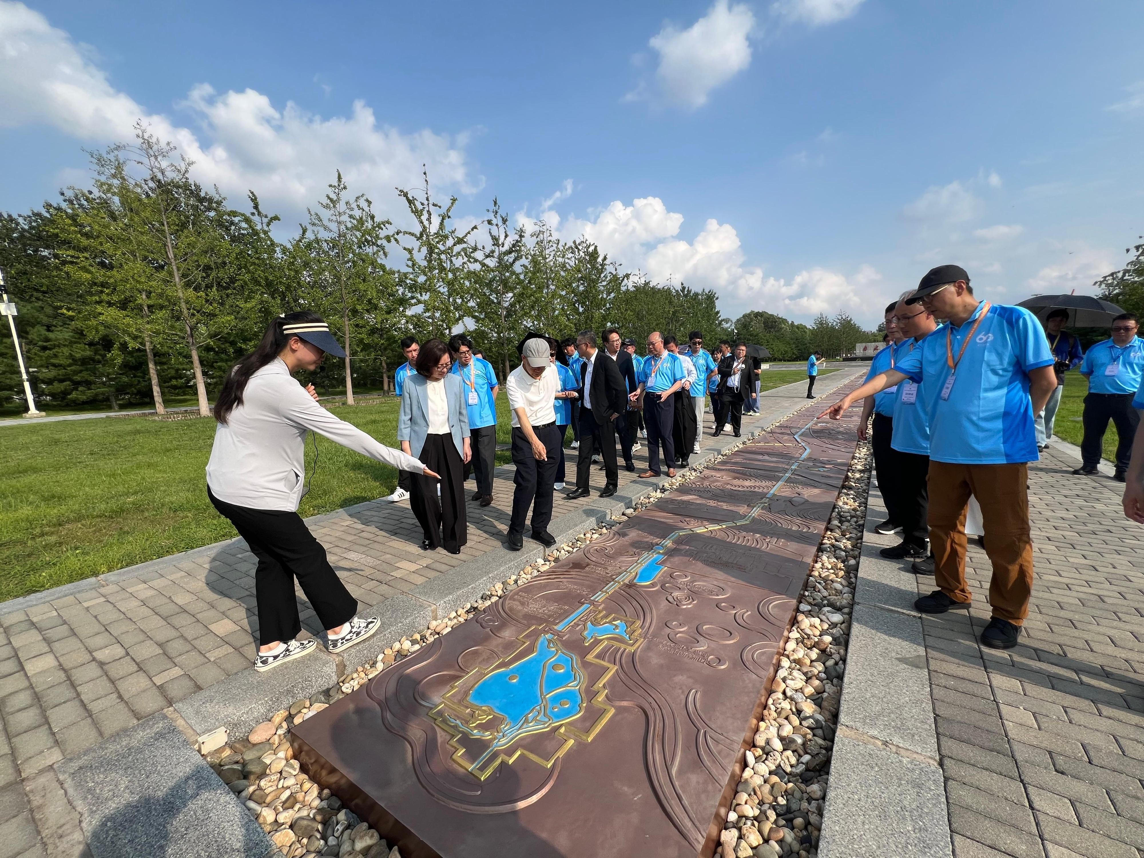 The Secretary for Development, Ms Bernadette Linn, began her visit to Beijing today (July 23). Photo shows Ms Linn (second left) touring the Tuancheng Lake Regulating Pond, the terminal of middle route of the South-to-North Water Diversion Project, with the study tour on national water infrastructure, culture and technology.
 
