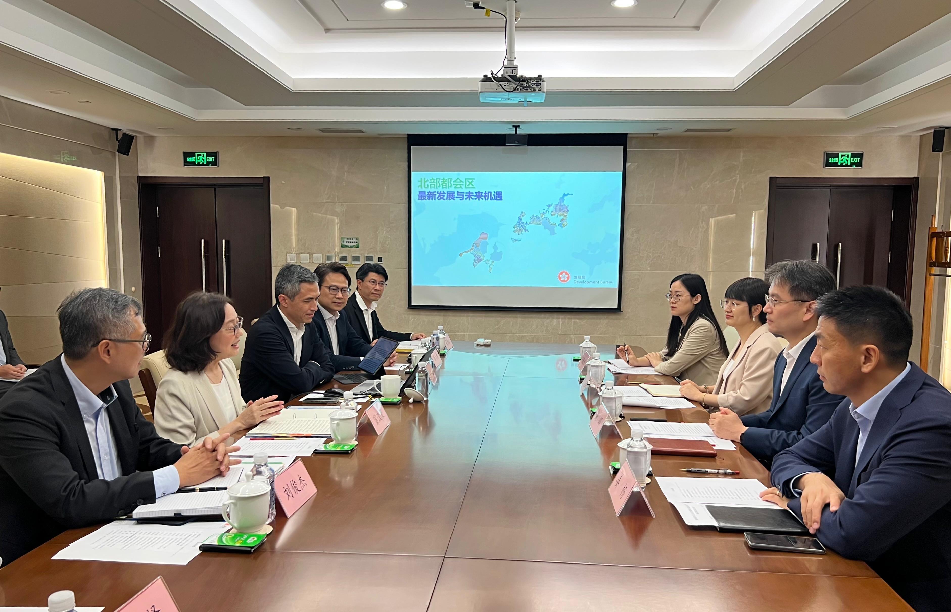 The Secretary for Development, Ms Bernadette Linn, continued her visit to Beijing today (July 24). Photo shows Ms Linn (second left) meeting with Deputy Director-General of the Bureau of International Cooperation of the State-owned Assets Supervision and Administration Commission of the State Council Mr Xie Hui (second right). The Permanent Secretary for Development (Works), Mr Ricky Lau (first left); and the Director of the Northern Metropolis Co-ordination Office, Mr Vic Yau (third left), also attended.