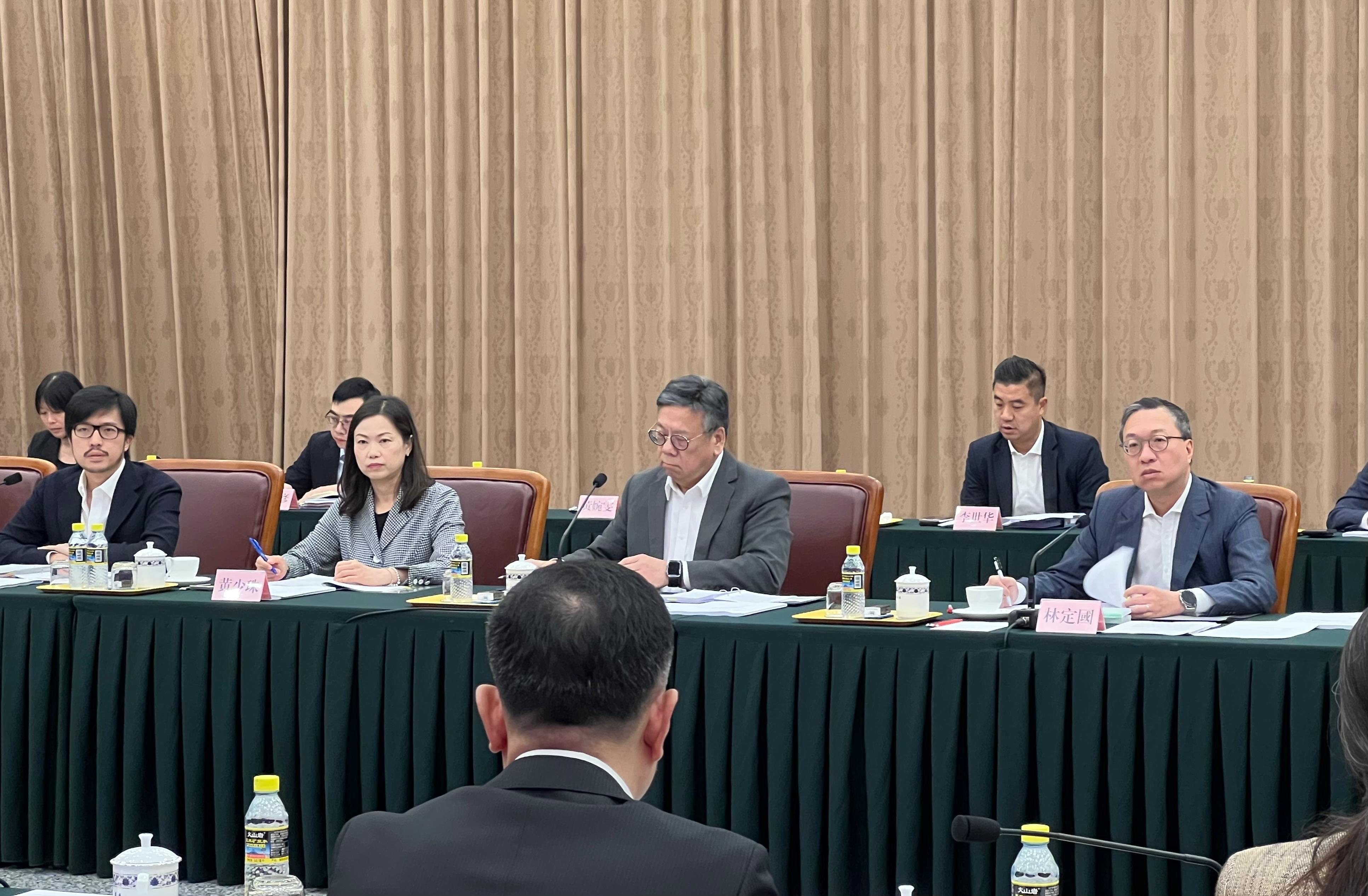The Government of the Hong Kong Special Administrative Region, the National Development and Reform Commission and relevant central ministries held the eighth Joint Conference on Advancing Hong Kong's Full Participation in and Contribution to the Belt and Road Initiative in Beijing today (July 25). Photo shows the Secretary for Justice and chairperson of the Working Group on Belt and Road Development under the Steering Group on Integration into National Development, Mr Paul Lam, SC (front row, first right); the Secretary for Commerce and Economic Development and Hong Kong-side Convenor of the Joint Conference, Mr Algernon Yau (front row, second right); the Permanent Secretary for Commerce and Economic Development, Ms Maggie Wong (front row, second left); and the Commissioner for Belt and Road, Mr Nicholas Ho (front row, first left), attending the conference.