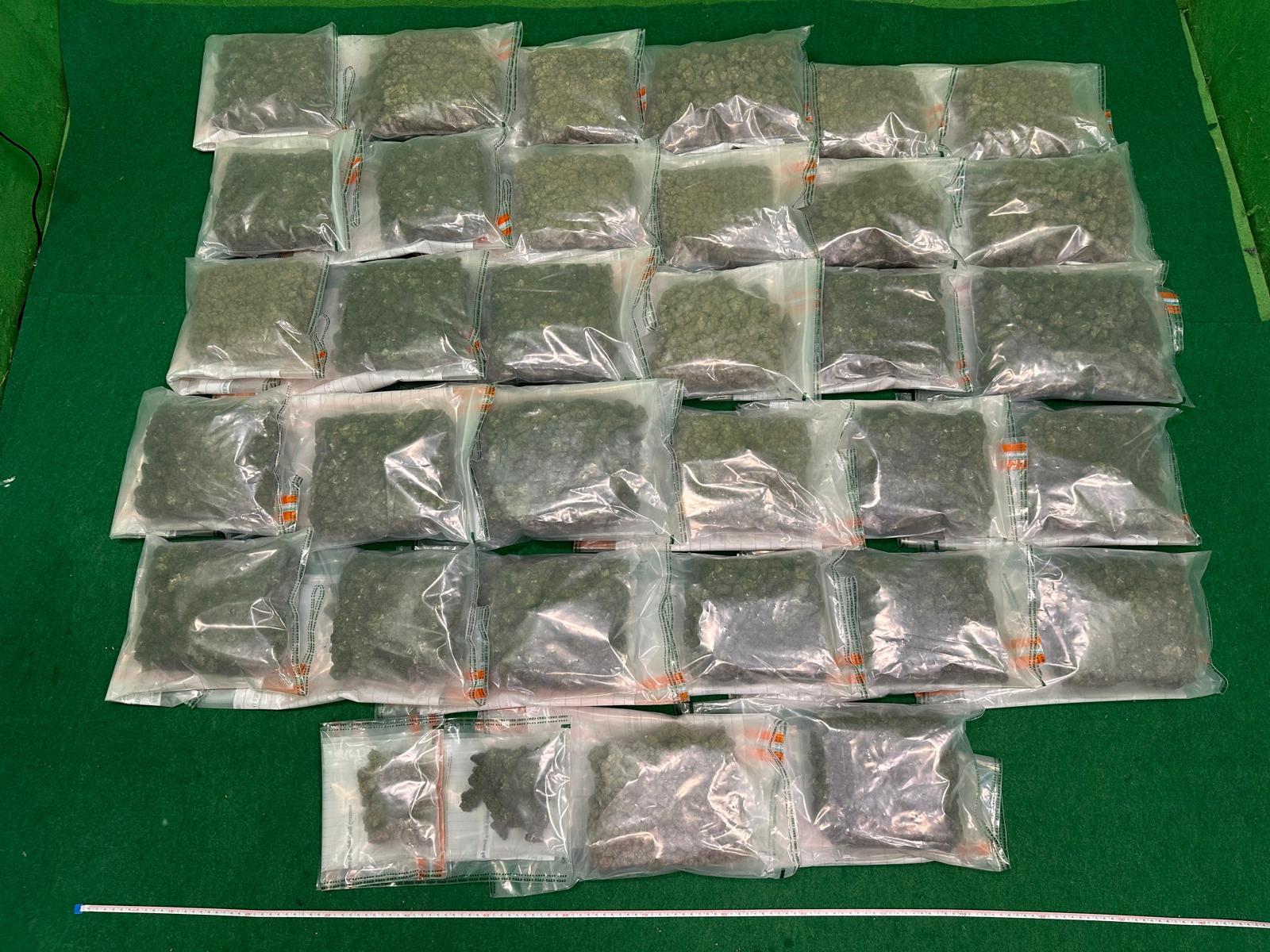 Hong Kong Customs today (July 25) detected a drug trafficking case involving baggage concealment at Hong Kong International Airport. About 16 kilograms of suspected cannabis buds with an estimated market value of about $3.4 million were seized. Photo shows the suspected cannabis buds seized.