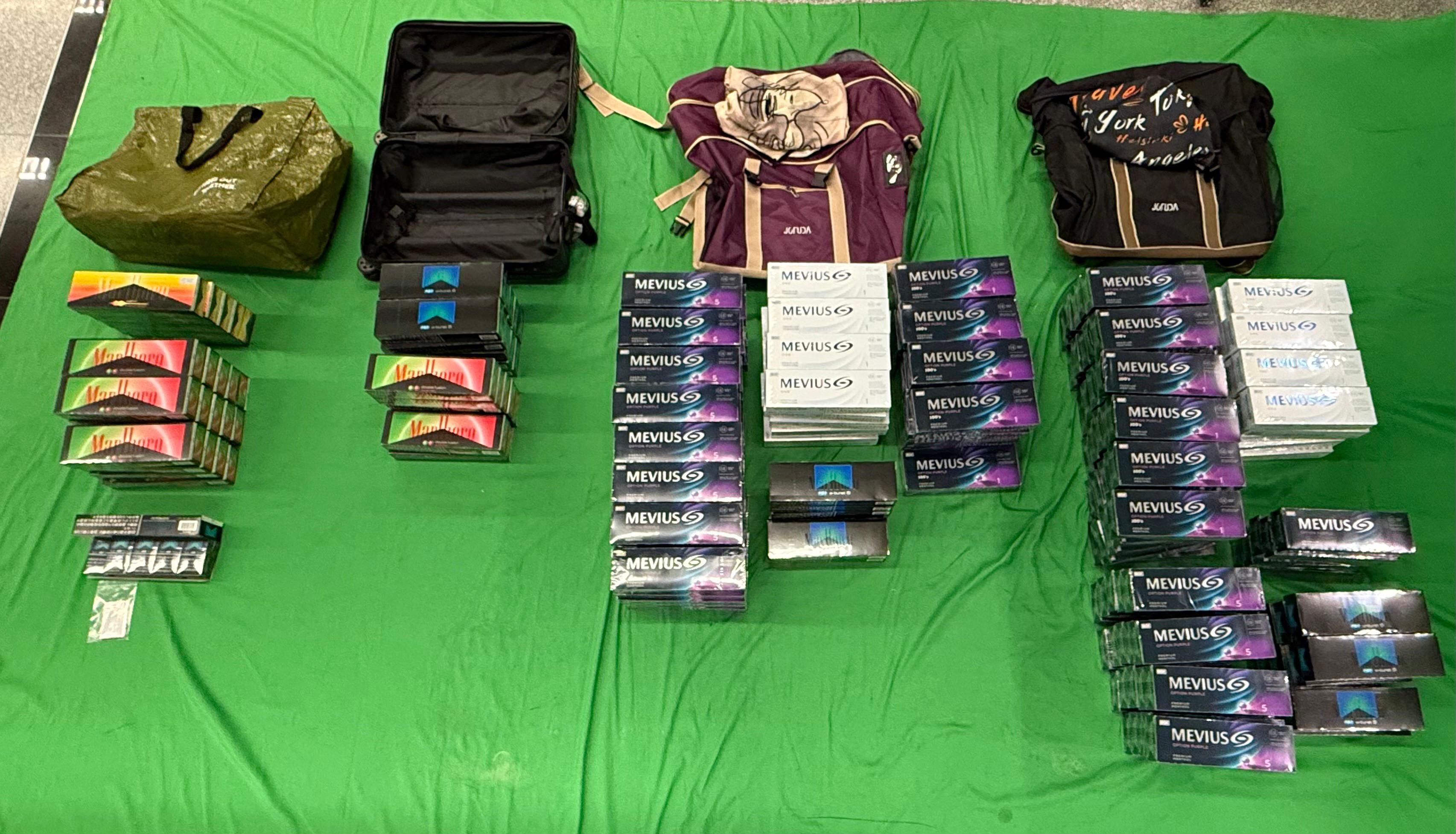 A 18-year-old incoming male passenger was sentenced to 6 months’ imprisonment and fined $800 at the Kowloon City Magistrates' Courts today (July 26) for possessing duty-not-paid cigarettes and failing to declare them to Customs officers, in contravention of the Dutiable Commodities Ordinance. Photo shows the duty-not-paid cigarettes seized.