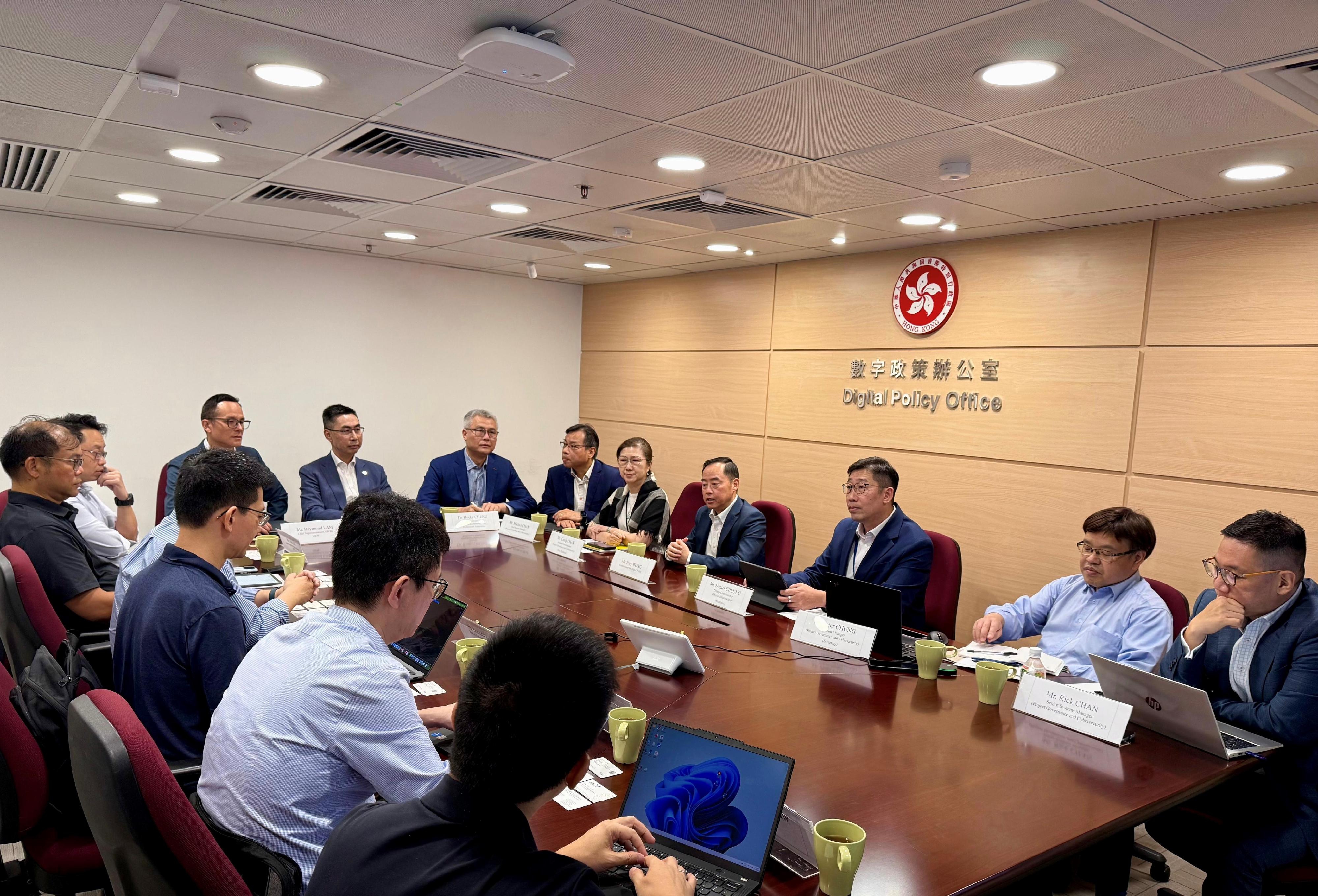 The Digital Policy Office held a special meeting with the Internet Infrastructure Liaison Group today (July 29) to discuss strategies for addressing increasingly severe cybersecurity challenges. Picture shows the Commissioner for Digital Policy, Mr Tony Wong (fourth right), addressing the meeting.