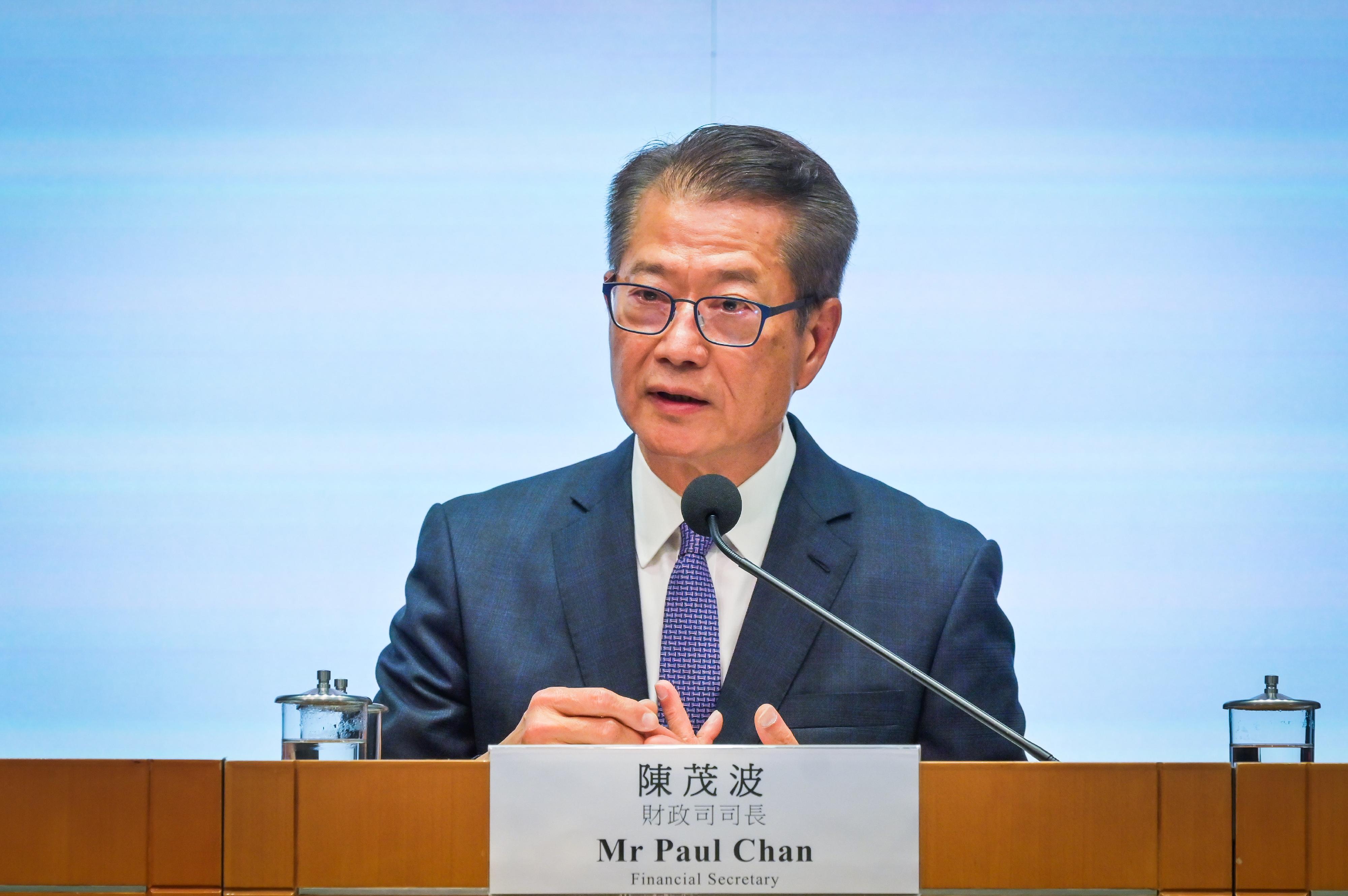 The Financial Secretary, Mr Paul Chan, delivers his opening remarks at the press conference on the "Report on Hong Kong's Business Environment: Unique Strengths under 'One Country, Two Systems'" today (July 30).
