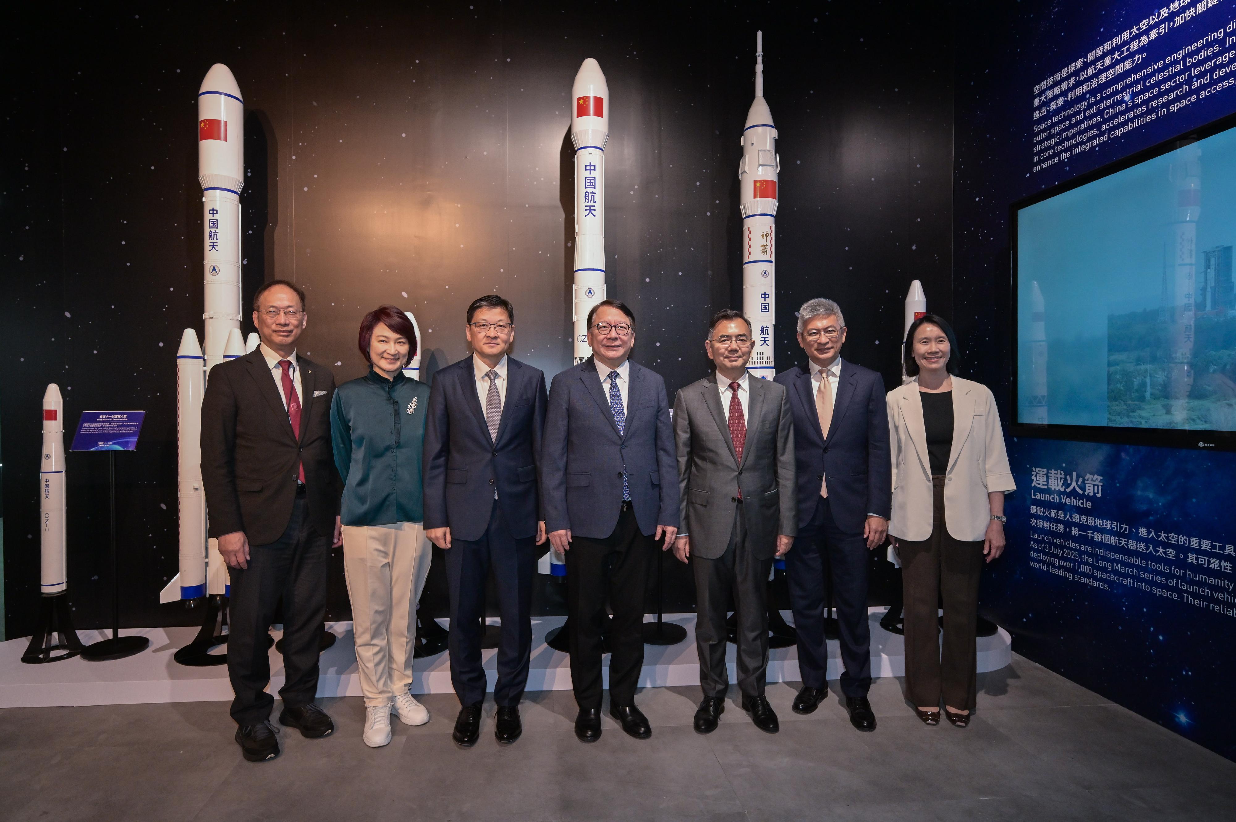 The Chief Secretary for Administration, Mr Chan Kwok-ki, attended the opening ceremony of the "Bank of China (Hong Kong) Presents: National Development and Achievements Series - Endless Exploration: The Journey of Chinese Aerospace, Aviation and Navigation" exhibition today (July 31). Photo shows Mr Chan (centre) touring the exhibition. Looking on are the Chief Engineer of the China National Space Administration, Dr Li Guoping (third right); the Vice Chairman and Chief Executive of Bank of China (Hong Kong) Limited, Mr Sun Yu (third left); the Convenor of the Working Group on Patriotic Education under the Constitution and Basic Law Promotion Steering Committee, Legislative Council Member, Dr Starry Lee (second left); the Chairperson of the Science Sub-committee of the Museum Advisory Committee, Professor Alexander Wai (first left); the Under Secretary for Culture, Sports and Tourism, Mr Raistlin Lau (second right); and the Director of Leisure and Cultural Services, Ms Manda Chan (first right).